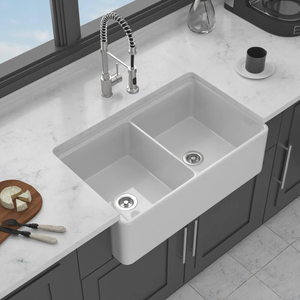 Angle. JUJABU - 33 x 20 x 10 inch White Ceramic Farmhouse Kitche Sink Workstation with Double Bowl - White.