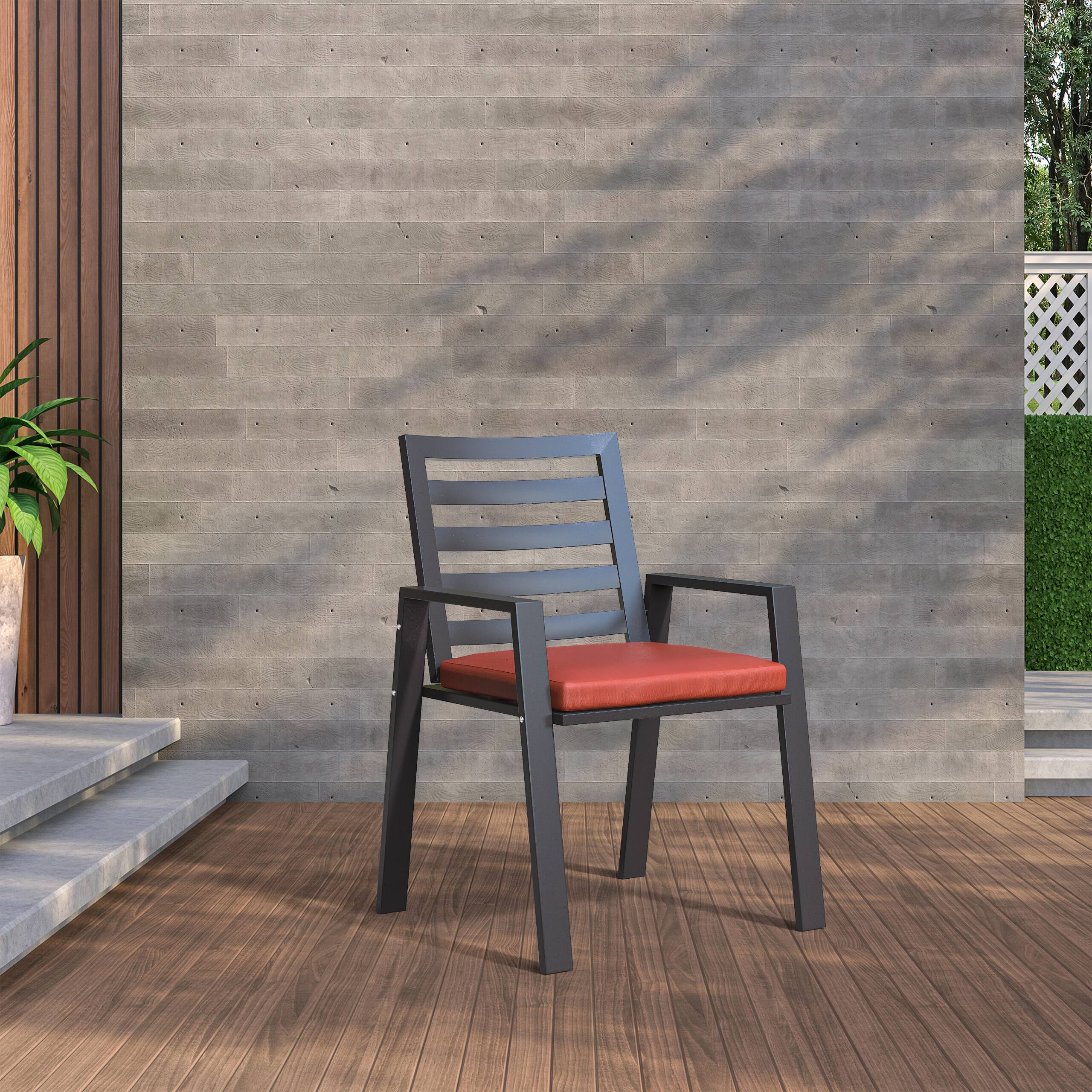 Angle. LeisureMod - Chelsea Mid-Century Modern Patio Dining Armchair with Weather-Resistant Olefin Cushion - Aluminum - Cherry Red.
