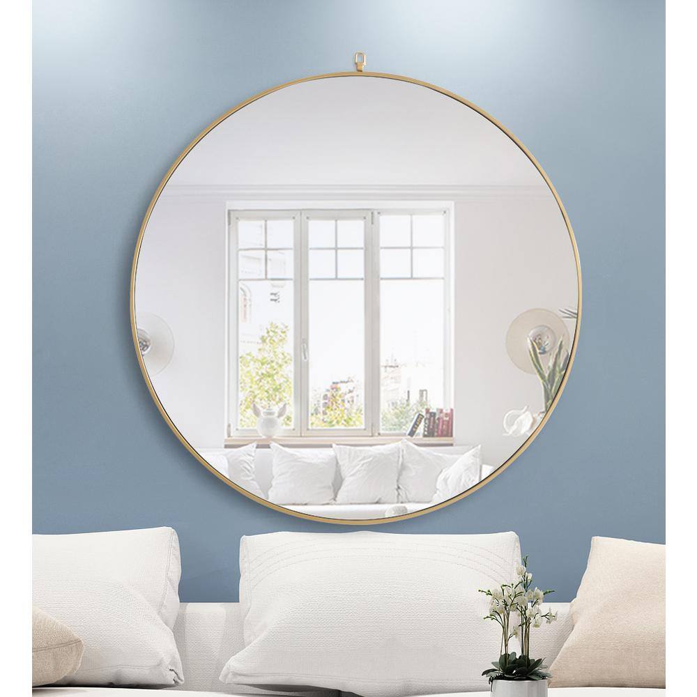 Left. Elegant Decor - Metal frame Round Mirror with decorative hook 48 inch Brass finish - Brass.