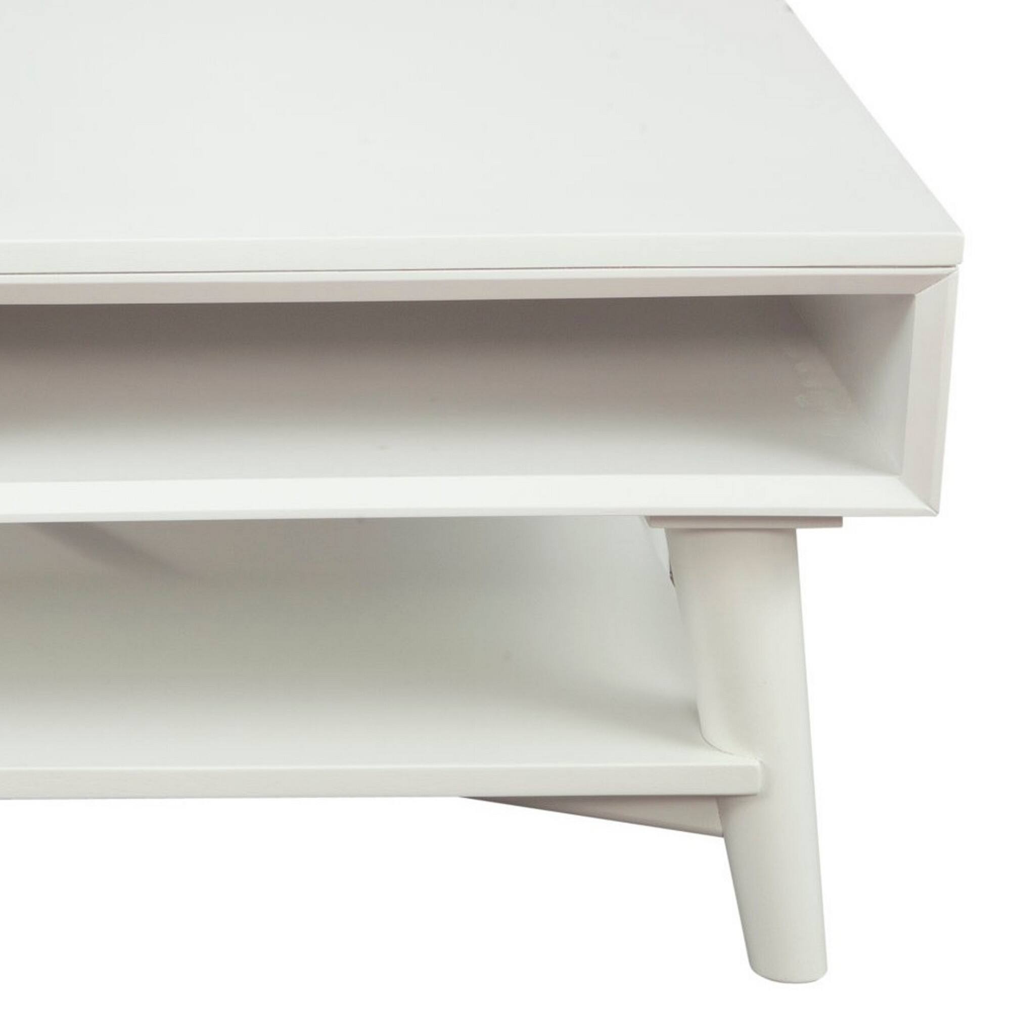 Side profile view of the white coffee table.