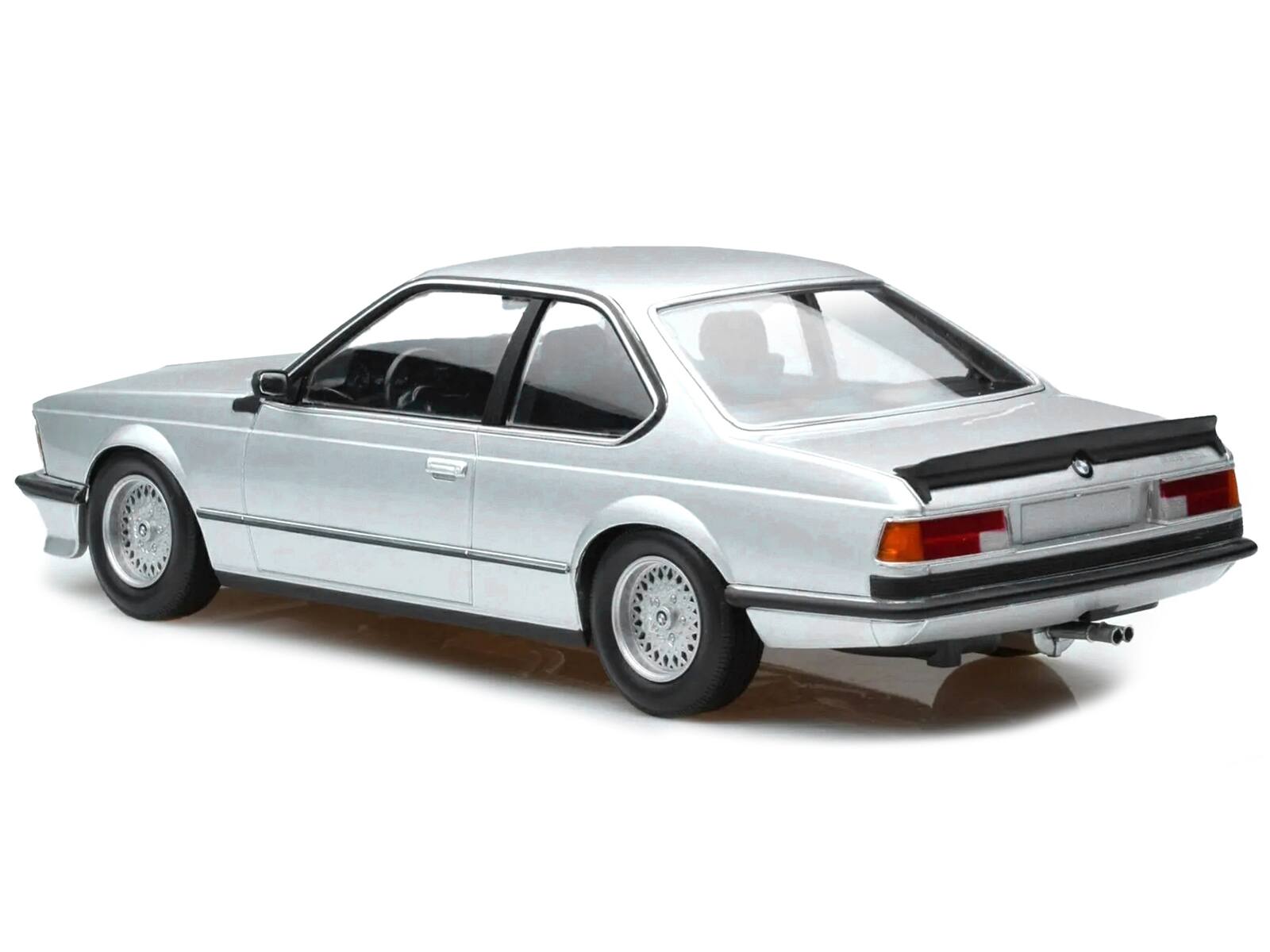 Left. Minichamps - 1982 BMW 635 CSi Silver Metallic 1/18 Diecast Model Car by Minichamps - Silver Metallic.