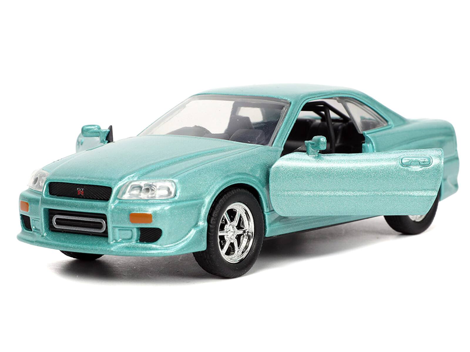Alt View 1. Jada - Brian's Nissan Skyline GT-R (BNR34) RHD Turquoise Metallic "Fast & Furious" Movie 1/32 Diecast Model Car by Jada - Multicolor.