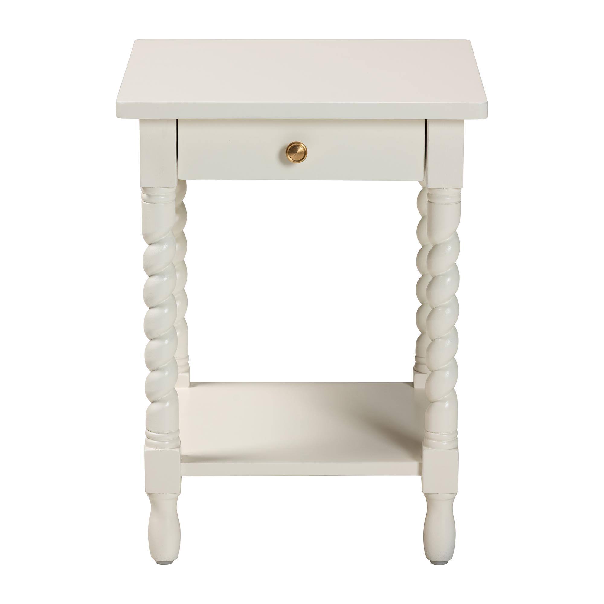 Left. bali & pari - Baxton Studio Niklas Nightstand with Twisted Legs - 1-Drawer Bedroom Side Table with Storage Shelf, White - White.