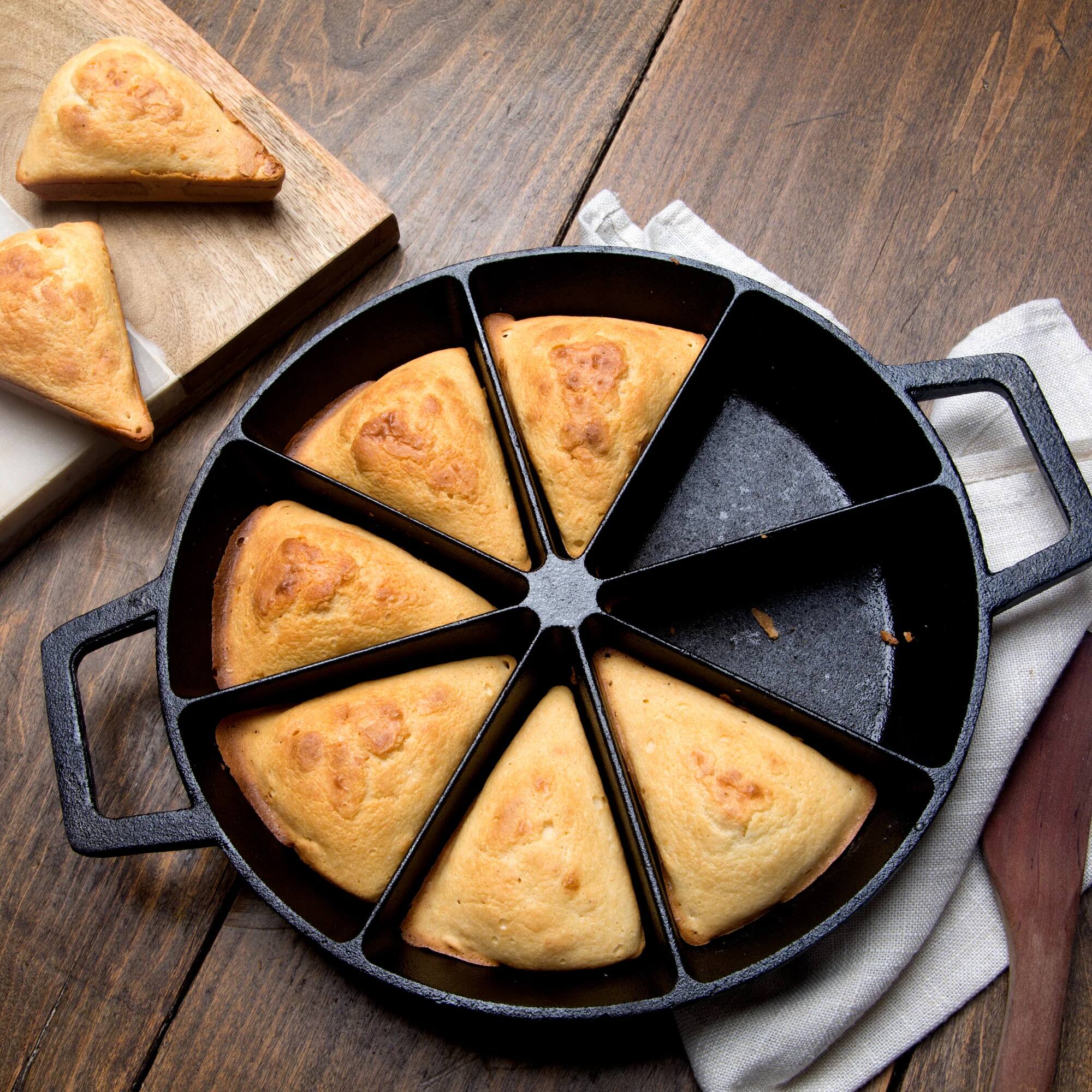 Alt View 2. Bayou Classic - Bayou Classic 10" Round Cast Iron Wedge Cornbread Skillet Pan with Loop Handles - Black.