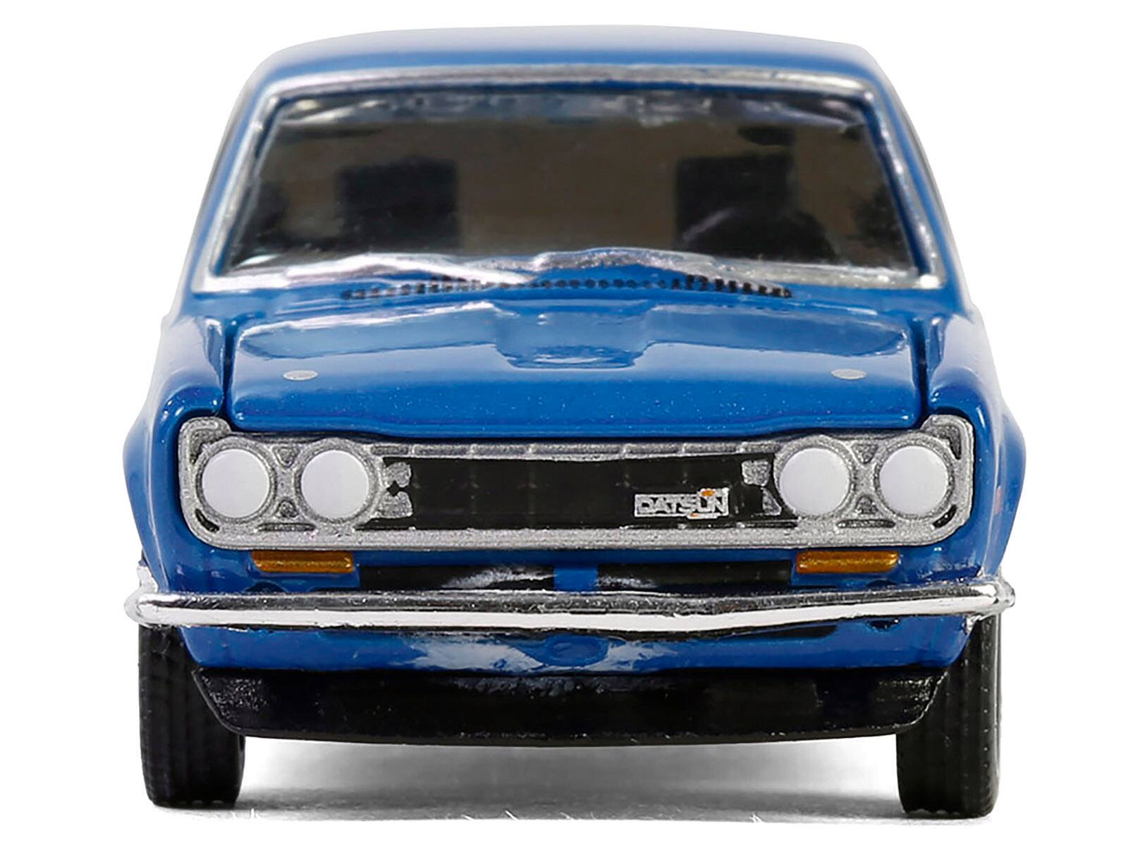Alt View 1. Greenlight - 1972 Datsun 510 Blue Metallic with White Stripes "Show it Like it is - a Champion" "Vintage Ad Cars" Series 11 1/64 - Blue Metallic with White Stripes.