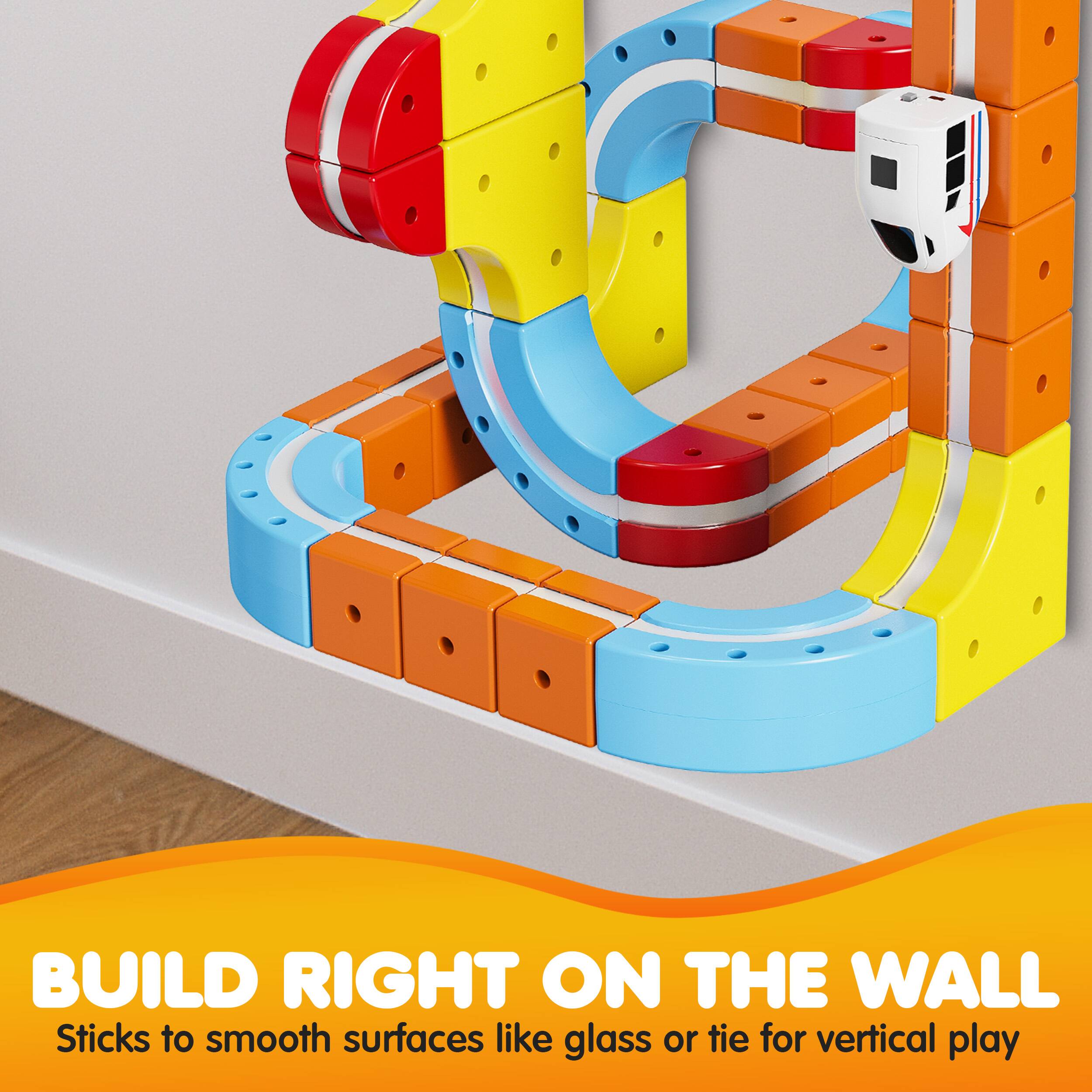 BUILD RIGHT ON THE WALL  
Sticks to smooth surfaces like glass or tie for vertical play