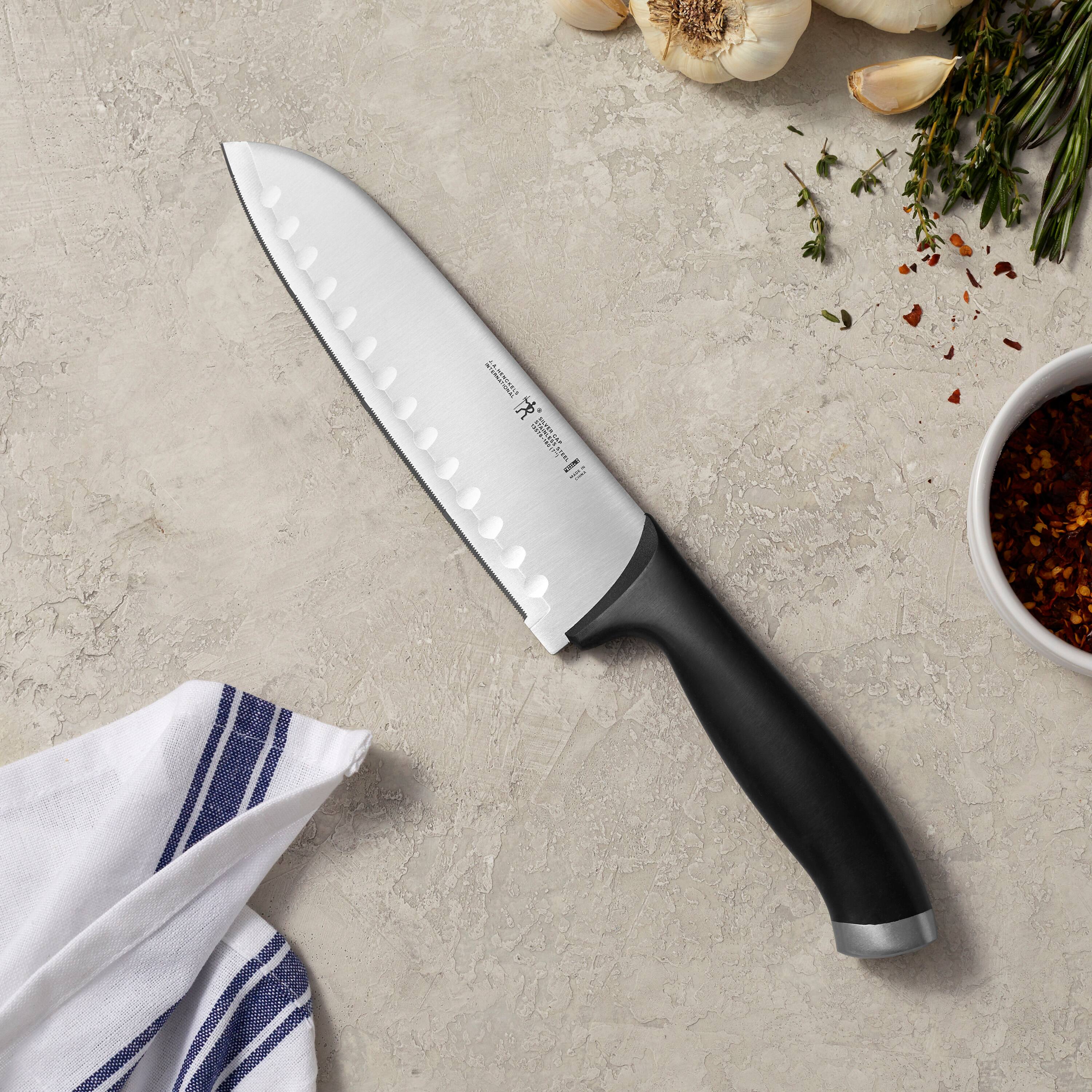Alt View 3. Henckels - HENCKELS Silvercap 7-inch Hollow Edge Santoku Knife - Stainless Steel.