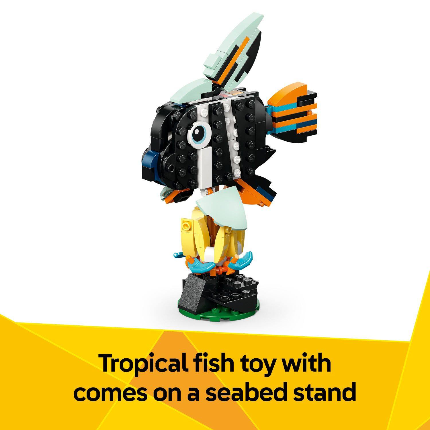 Tropical fish toy with a seabed stand