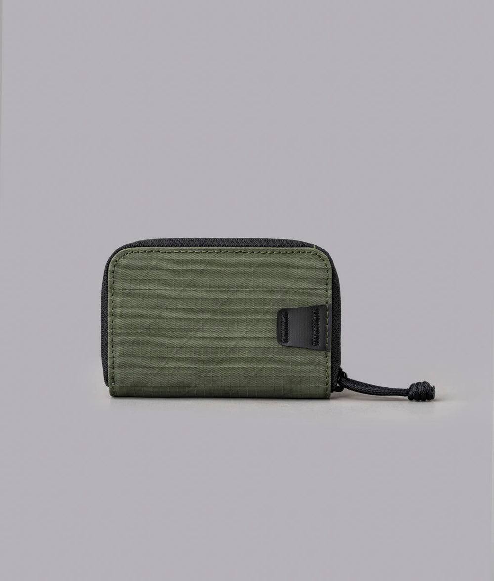 Back. ALPAKA - Zip Coin Wallet with RFID Protection, Water-Resistant Compact Card & Coin Holder - Green Axogrid 210D.