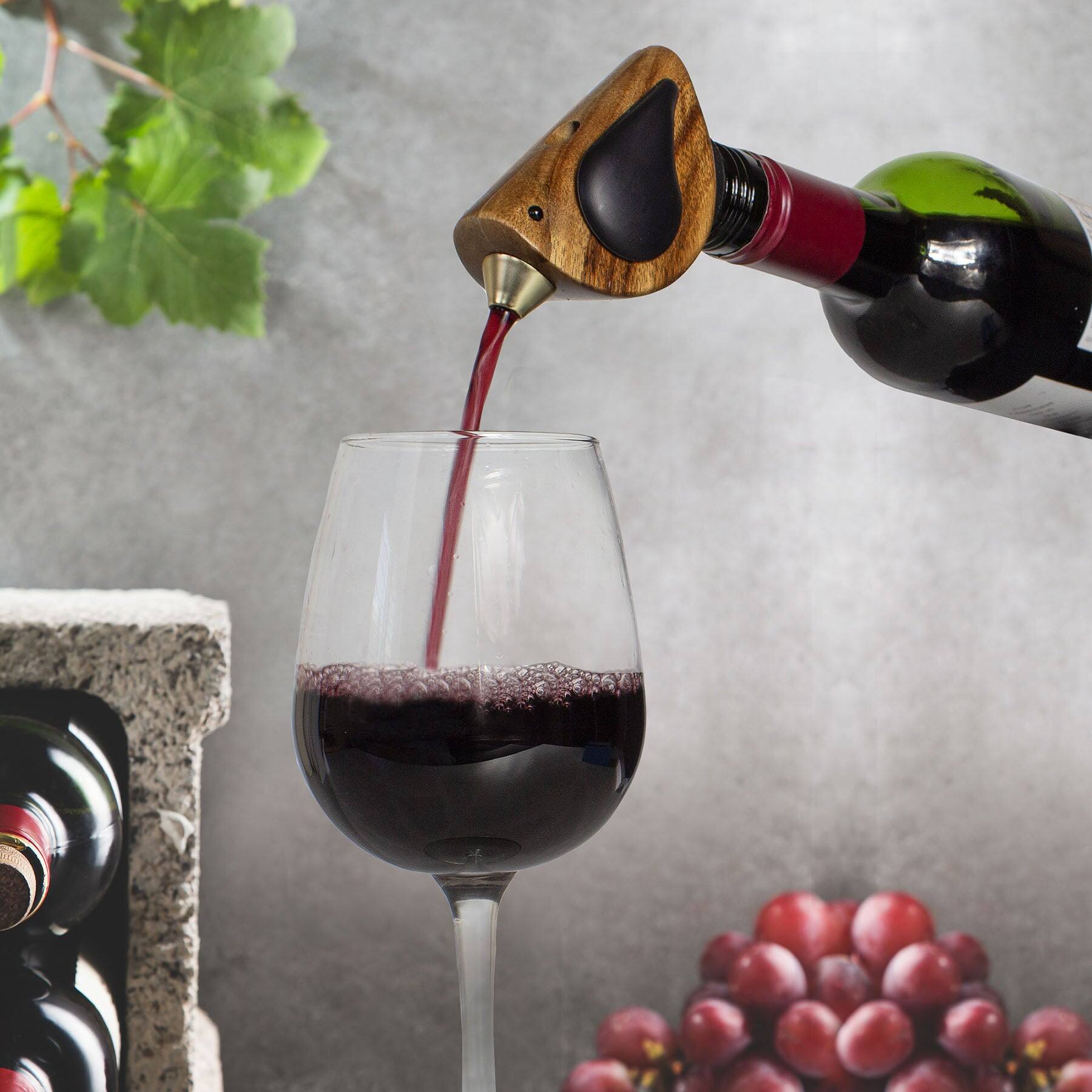 Left. Songbird Specialties - "Singing" Wine Bottle Pourer, Black - Brown, Black.