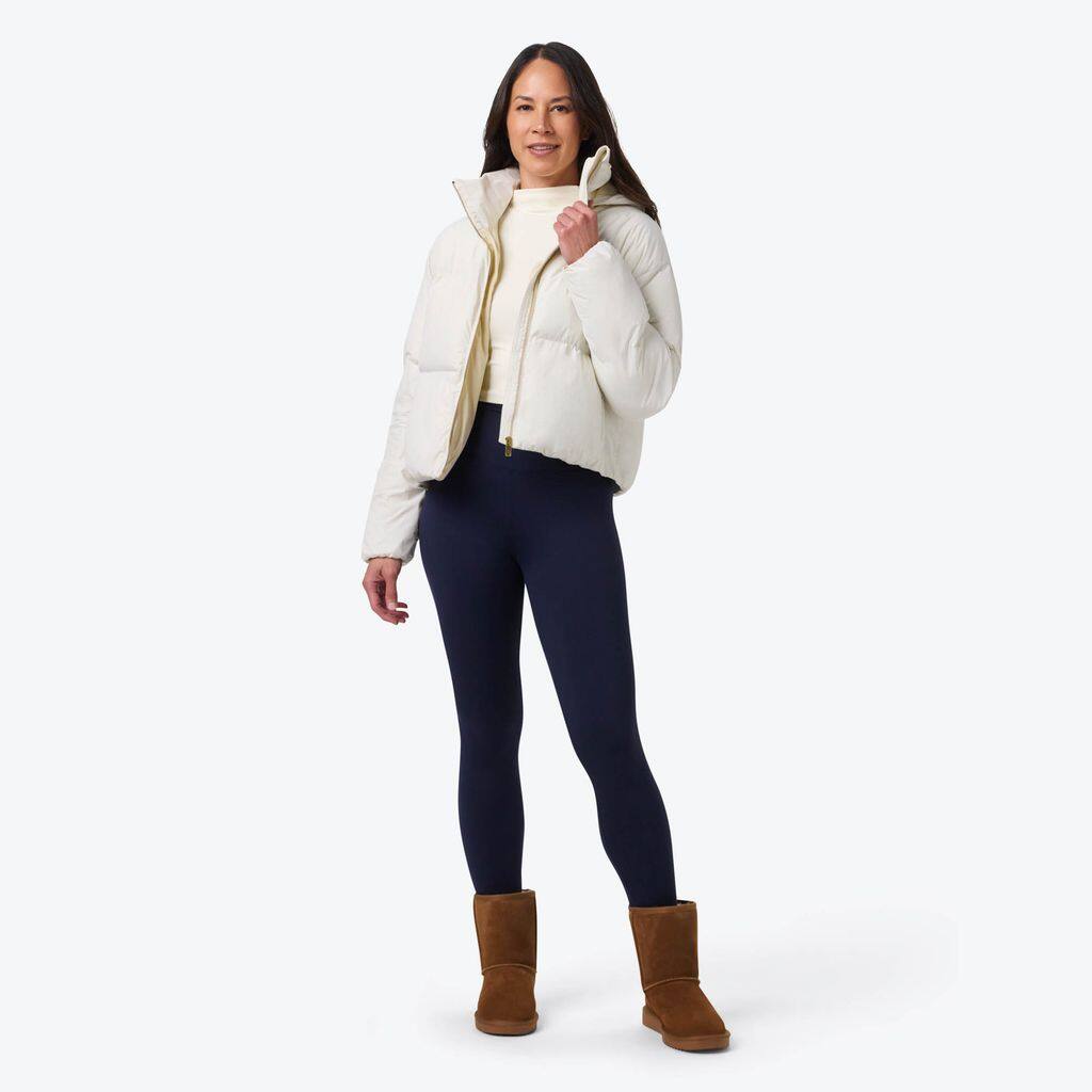 Left. Mobile Warming - App Controlled Women's Cloud IX Crop Puffer Heated Jacket - Cream.
