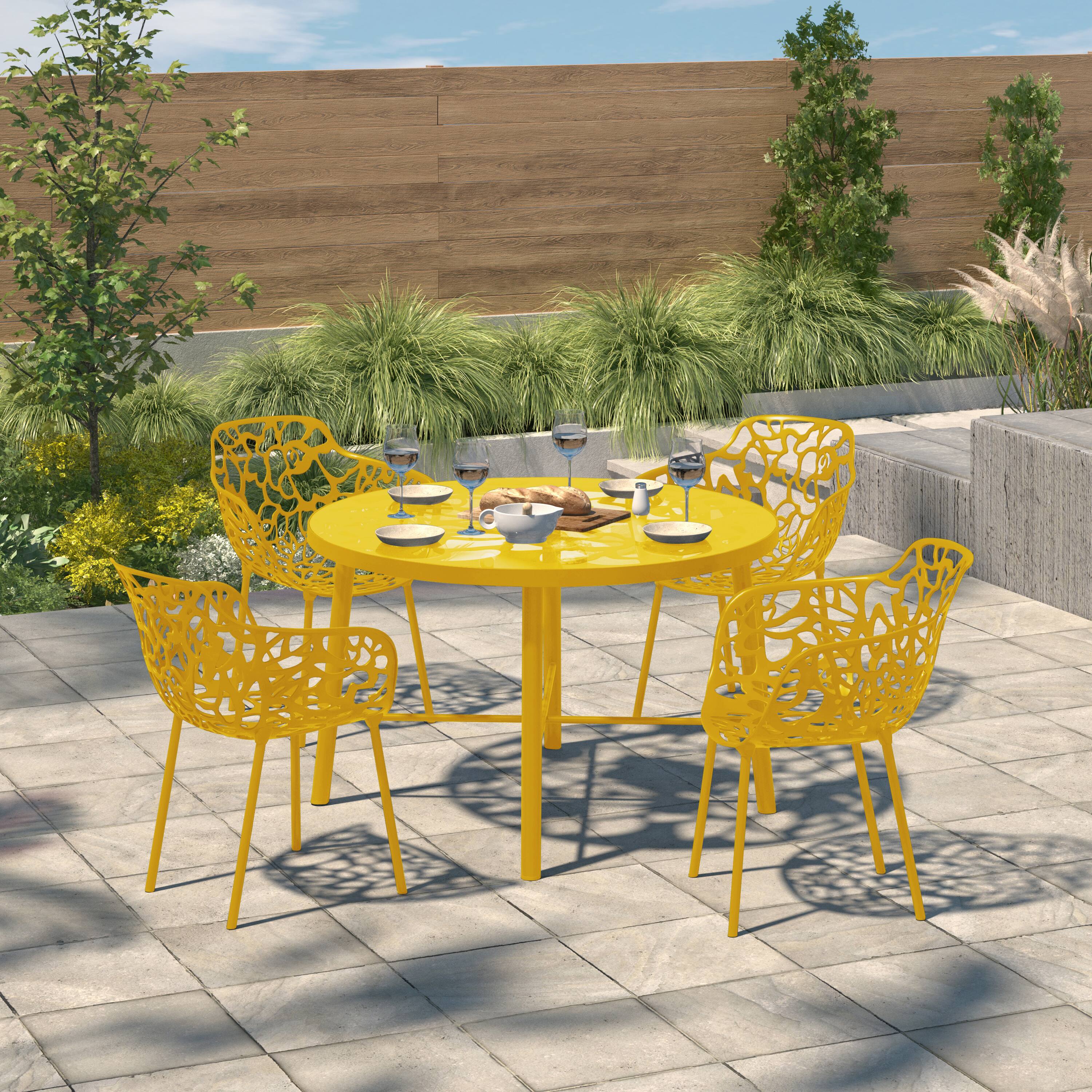 Angle. LeisureMod - Devon (Set of 4) Aluminum Outdoor Dining Chair - UV & Rust Resistant Stackable Floral Accent Chair - Yellow.