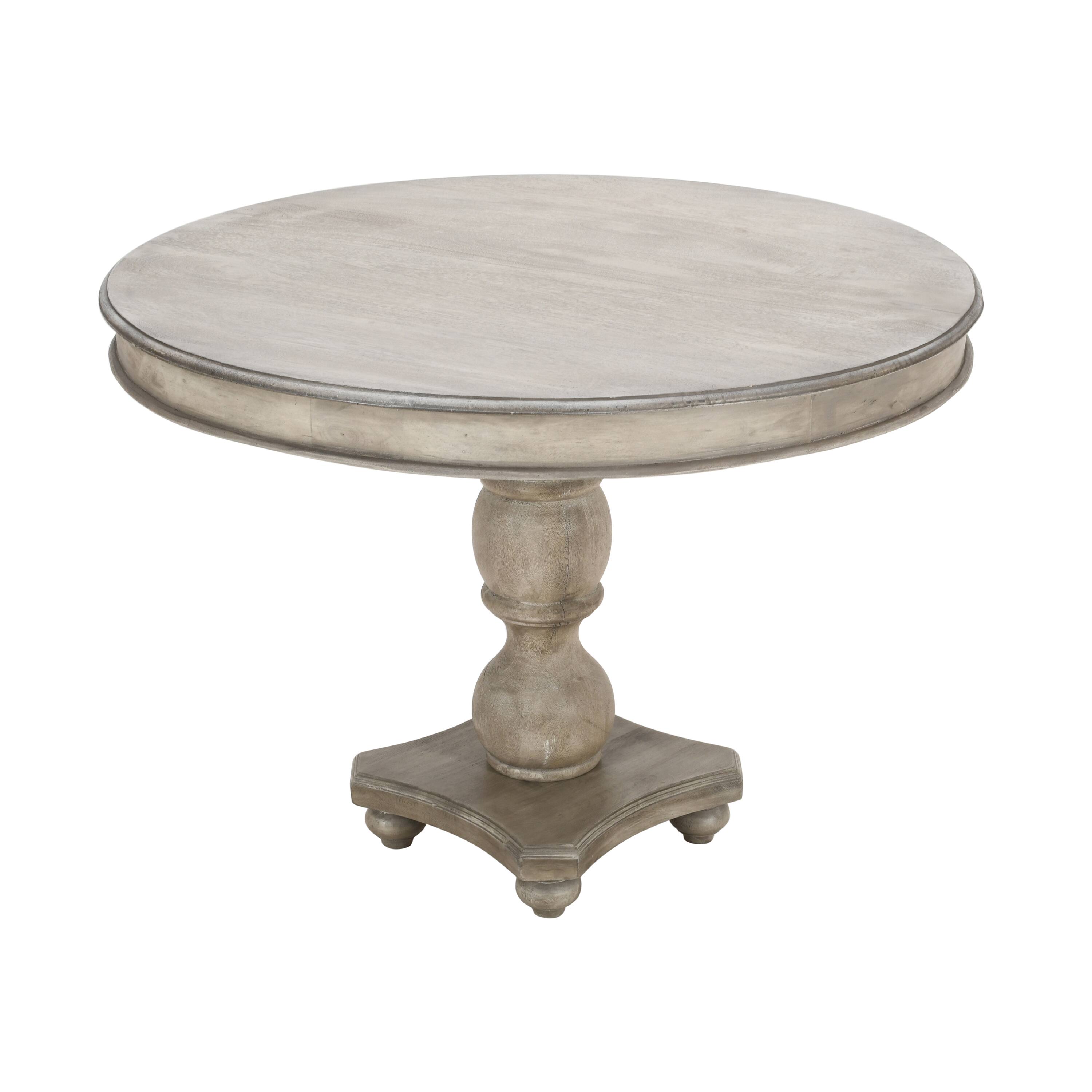 Angle. Manhattan Lane - 42 Inch Handcrafted Mango Wood Dining Table, Pedestal Base, Round Molded Top - Washed White and Gray.