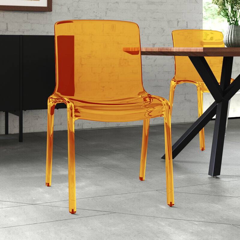 Angle. LeisureMod - Murray Modern Stackable Acrylic Accent Dining Chair with Transparent Seat for Dining Room, Kitchen & Office - Transparent Orange.