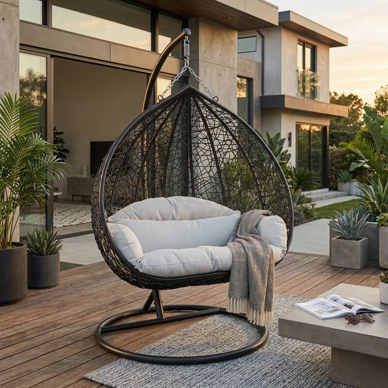 Angle. LeisureMod - Recluse Modern Wicker Teardrop Hanging Egg Chair with Stand - Heavy Duty, Outdoor Indoor Swing Chair & Cushion - Arctic White.