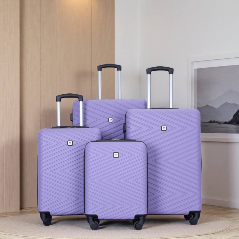 Angle. BreeBe - 4-Piece ABS Lightweight Suitcase Set with Rotating Wheels and TSA Lock - Light Purple.