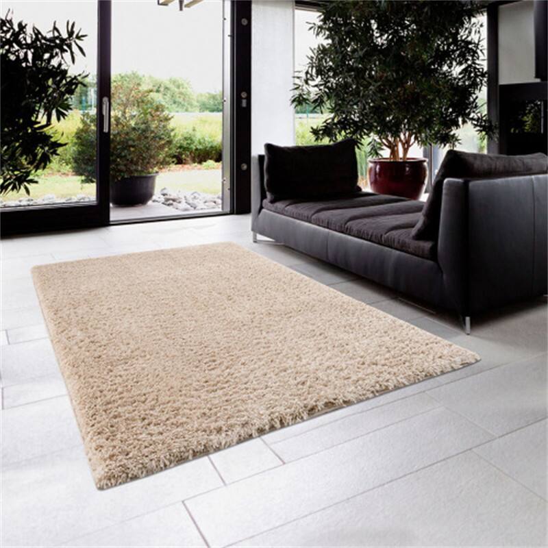 Angle. HTUTWOO - Polyester Shag Area Rug - Cream 4x6, Machine Woven Plush Rug, High Pile 0.75", Soft Pile for High-Traffic Areas - Cream.