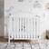 Left. Graco - Stella 4-in-1 Convertible Mini Crib - White.
