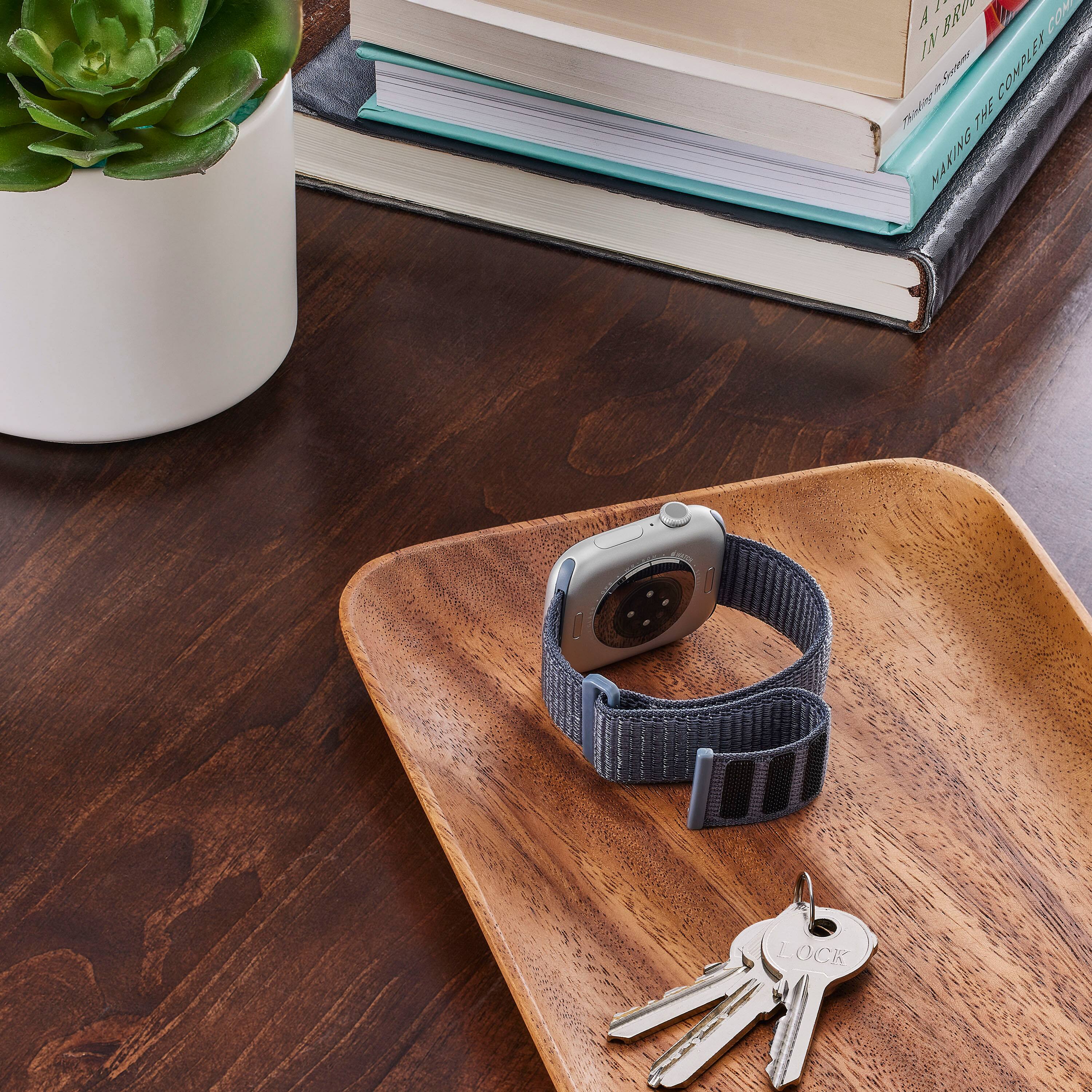 The text on the image reads: "Introducing the Nike+ FuelBand SE. Track your activity. Set goals. Get fit."