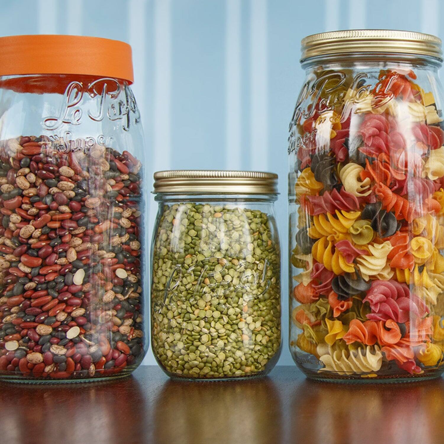 Alt View 2. Le Parfait - Screw Top Jar - 3L Wide Mouth French Glass Canning Jar w/ ColorPlastic Lid, 96oz/3 Quarts (Pack of 3) - ORANGE.