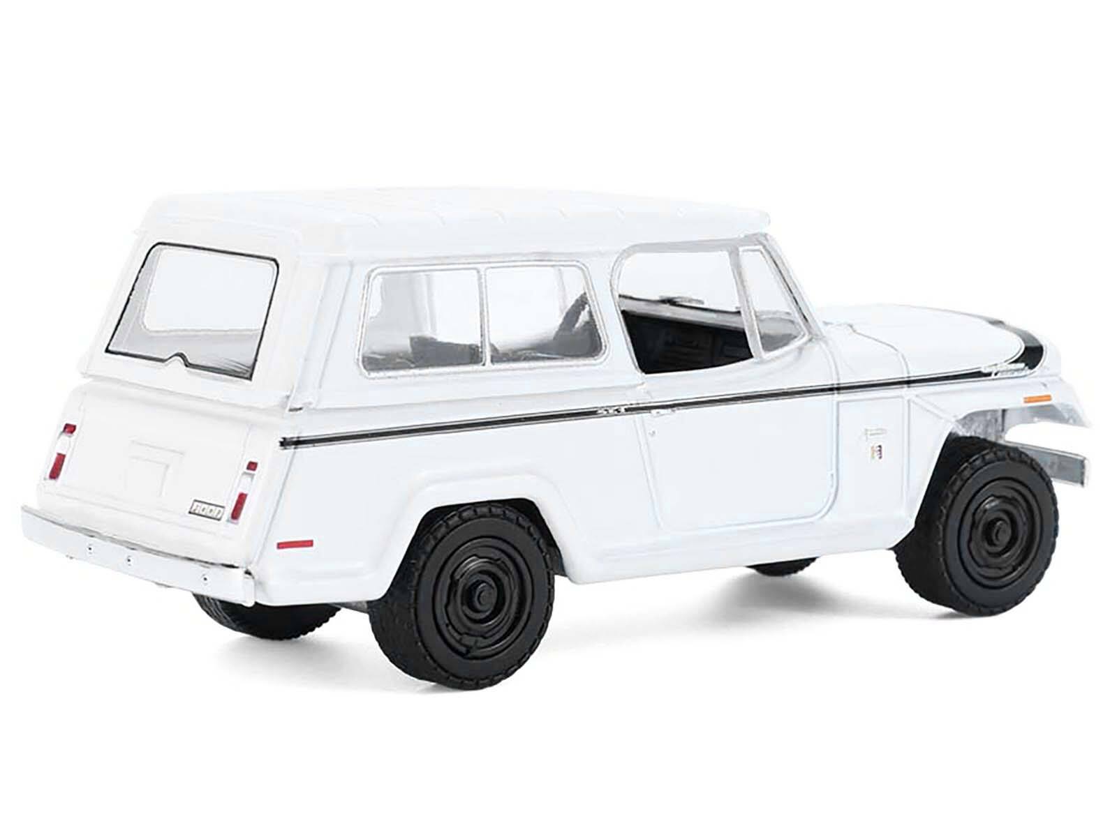 Alt View 3. Greenlight - 1971 Jeep Jeepster Commando White with Black Stripes "All Terrain" Series 1/64 Diecast Model Car by Greenlight.
