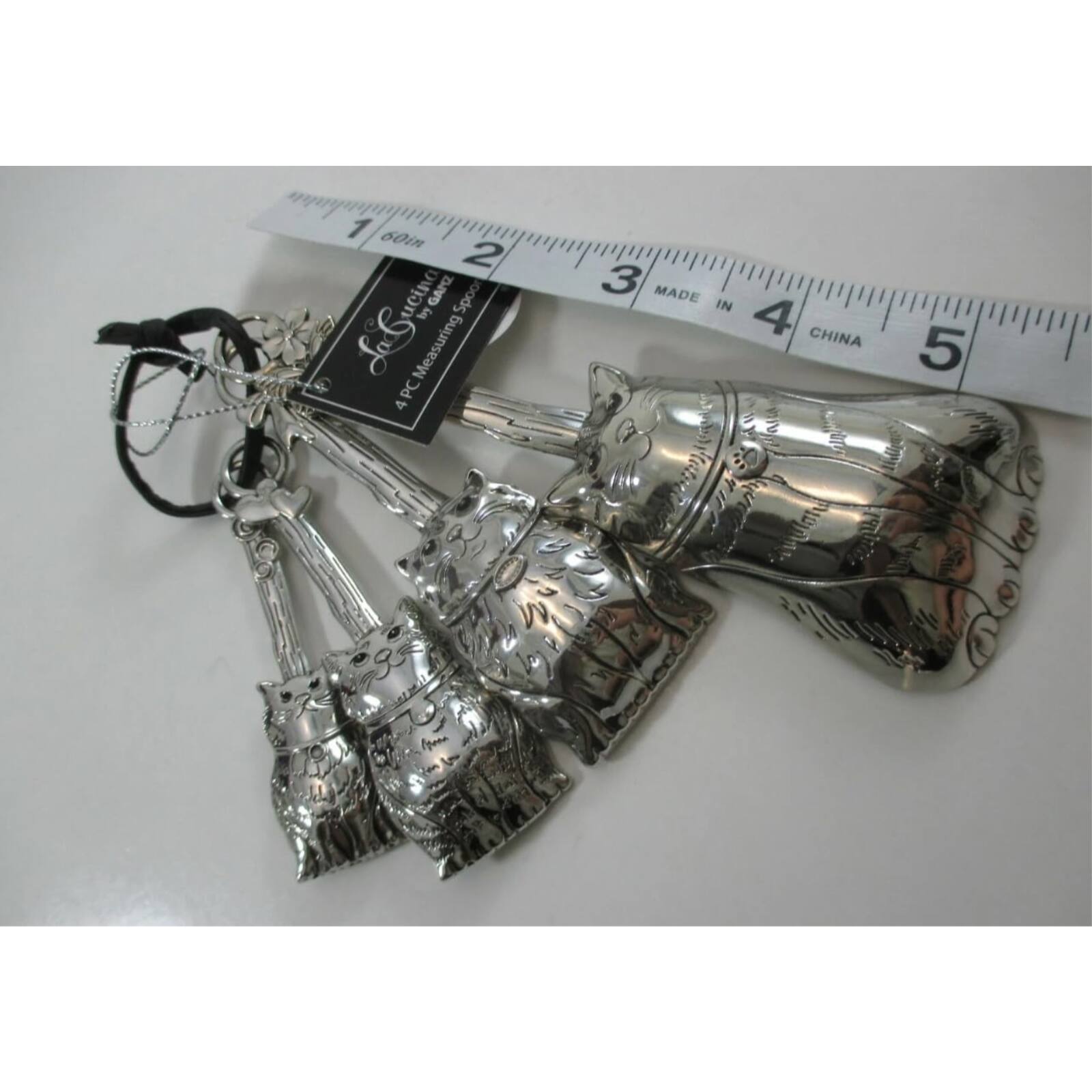 1. 60in
2. uCino GAMZ Spoor LoLucina
3. in Measuring C PC
4. 4
5. MADE IN CHINA
6. 5 in