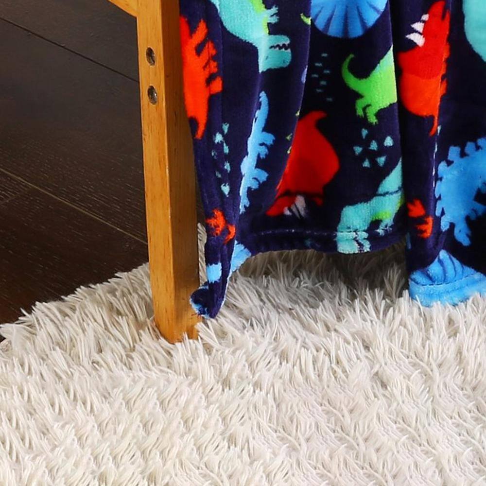 Alt View 1. Noble House - Plazatex Holiday Navy Dinosaur Design Micro Plush Throw Blanket - 50x60" Multicolor - Multi.