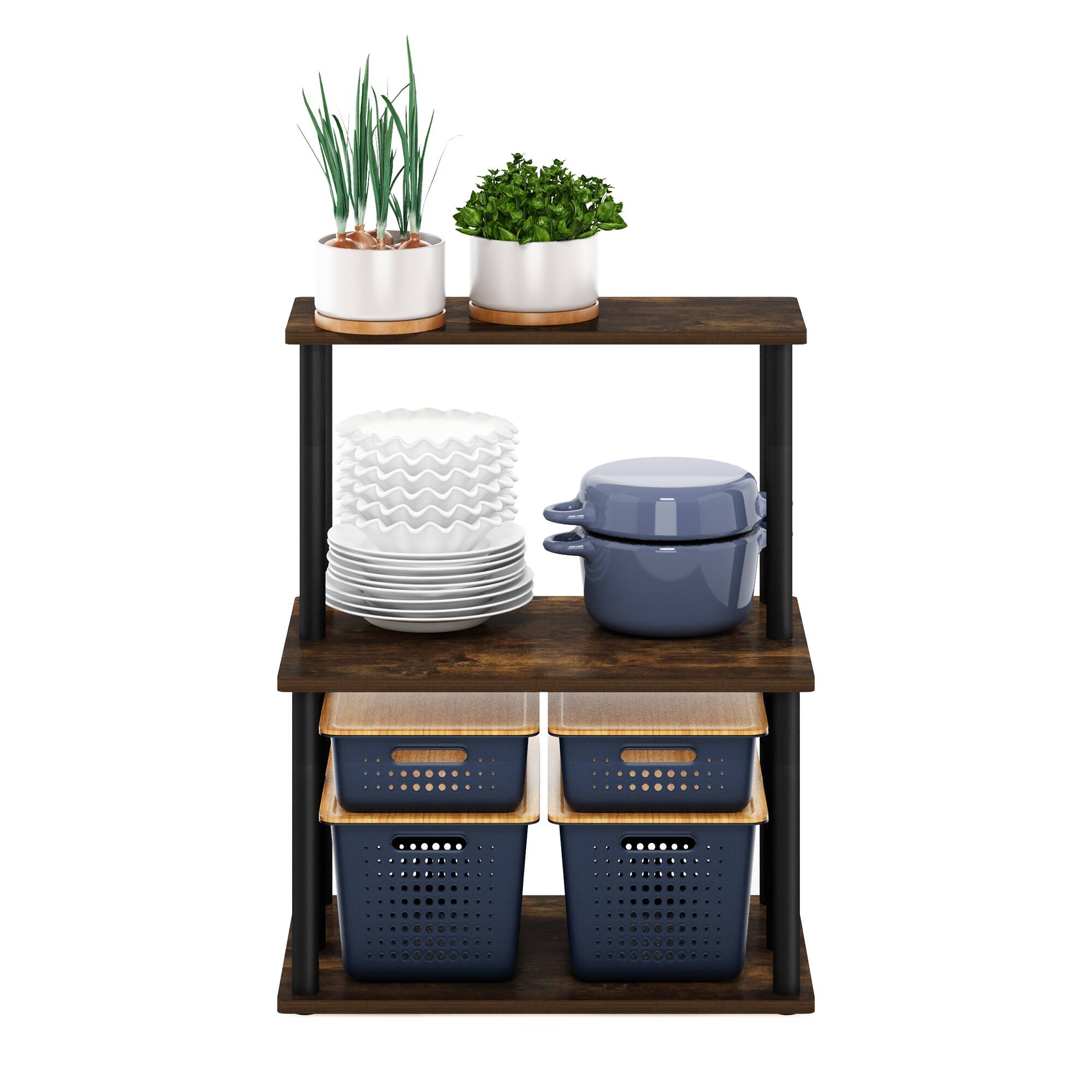 The image shows a wooden kitchen shelf with three levels. On the top shelf, there are two potted plants. The middle shelf has a stack of white plates and a blue pot. The bottom shelf has two blue baskets with wooden lids.