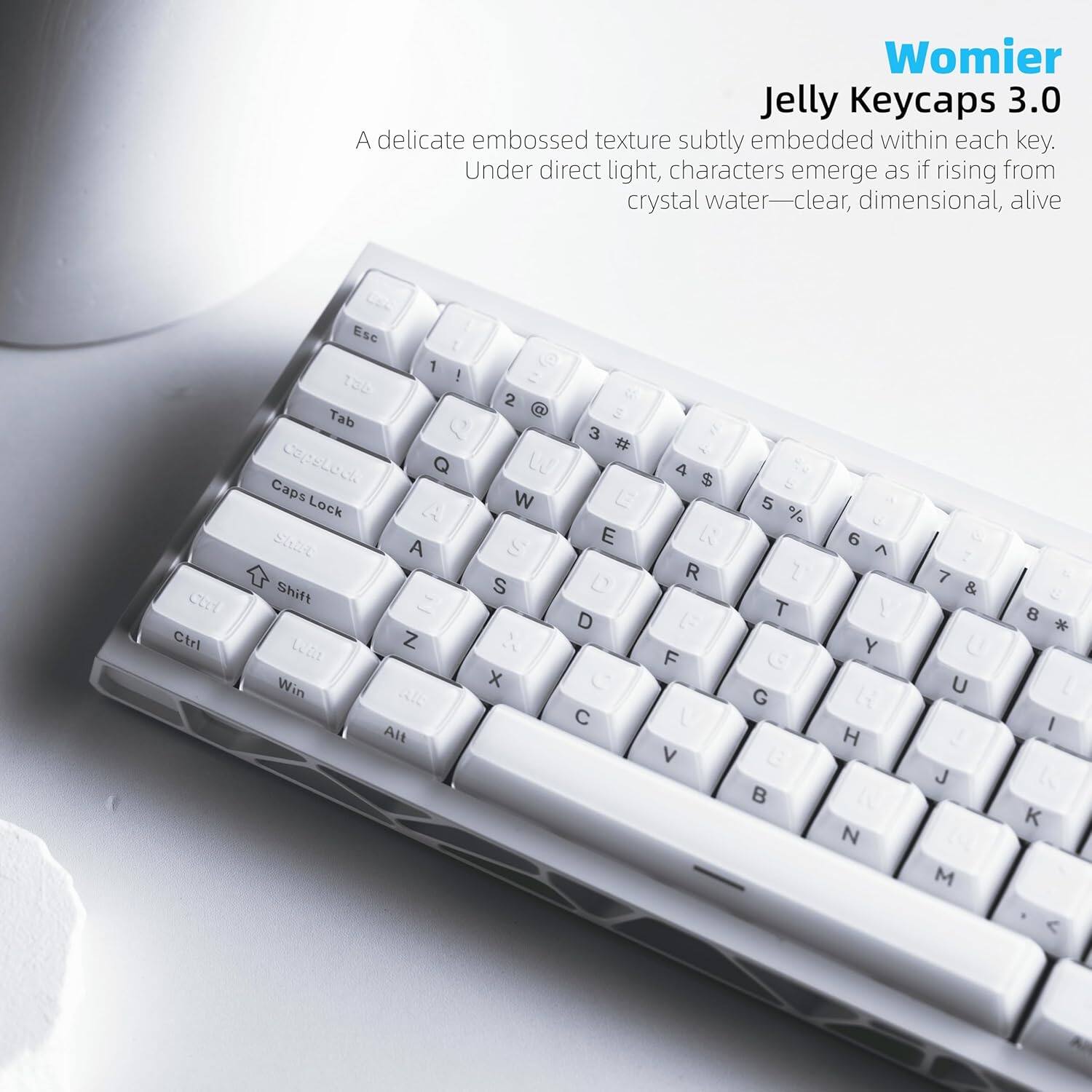 Womier Jelly Keycaps 3.0  
A delicate embossed texture subtly embedded within each key. Under direct light, characters emerge as if rising from crystal water—clear, dimensional, alive.