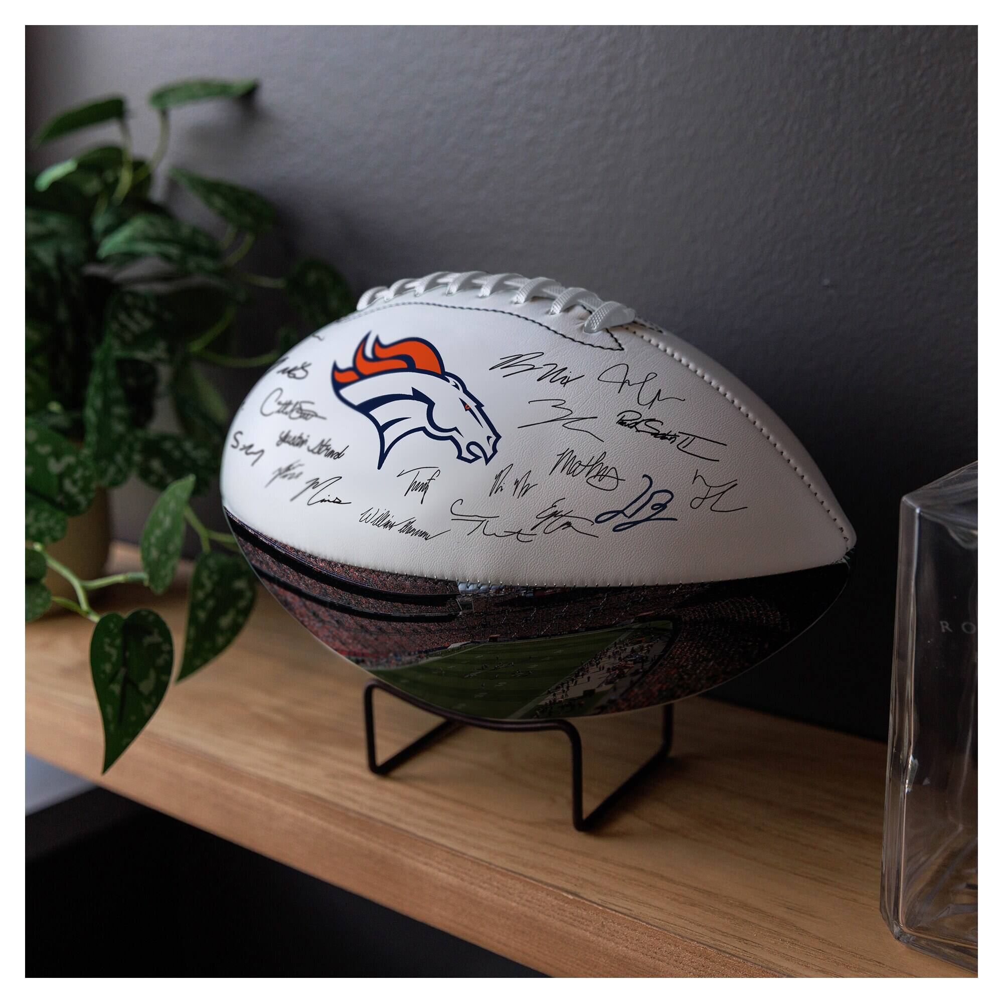 Sure, here is the corrected and grouped text from the image:

**Front of the Football:**
- "Brett Alvarado"
- "Mom & Dad"
- "William Thomas"
- "To: Caleb"
- "Say thank you for everything"
- "To: Mia"
- "Hail to the Chief"

**Side of the Football:**
- "To: Shat"
- "Brand thatenr nothing"
- "To: Mia"
- "Hail to the Chief"

**Back of the Football:**
- "To: Hail to the Chief"