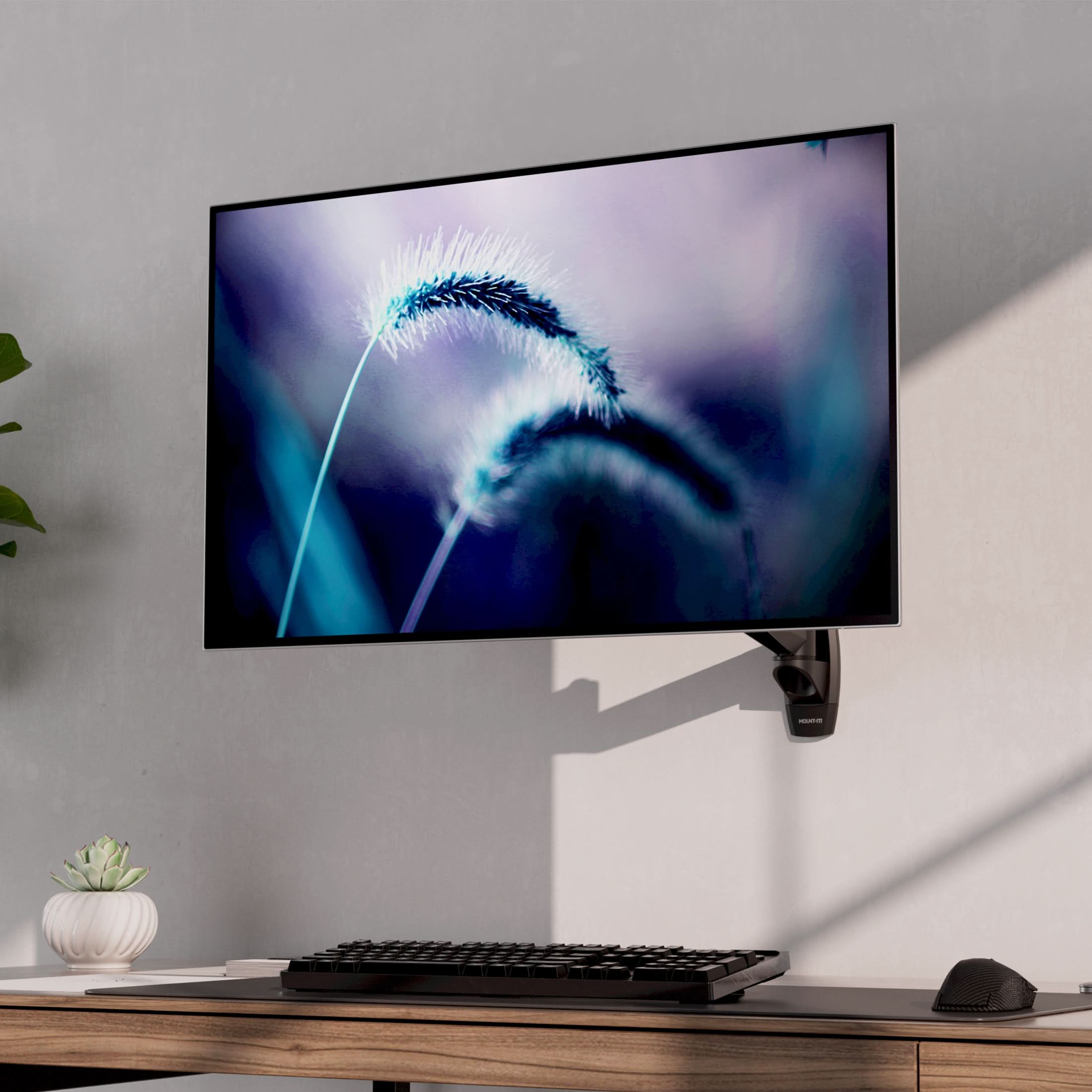 Alt View 1. Mount-It! - CLiX Series Multi-Jointed Monitor Wall Mount for 13"-34" Screens, Swivel & Tilt, Black - Black.