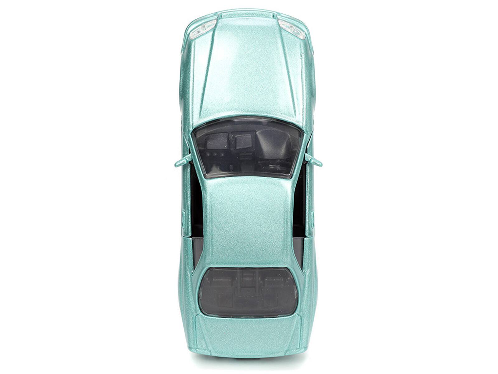 Alt View 6. Jada - Brian's Nissan Skyline GT-R (BNR34) RHD Turquoise Metallic "Fast & Furious" Movie 1/32 Diecast Model Car by Jada - Multicolor.