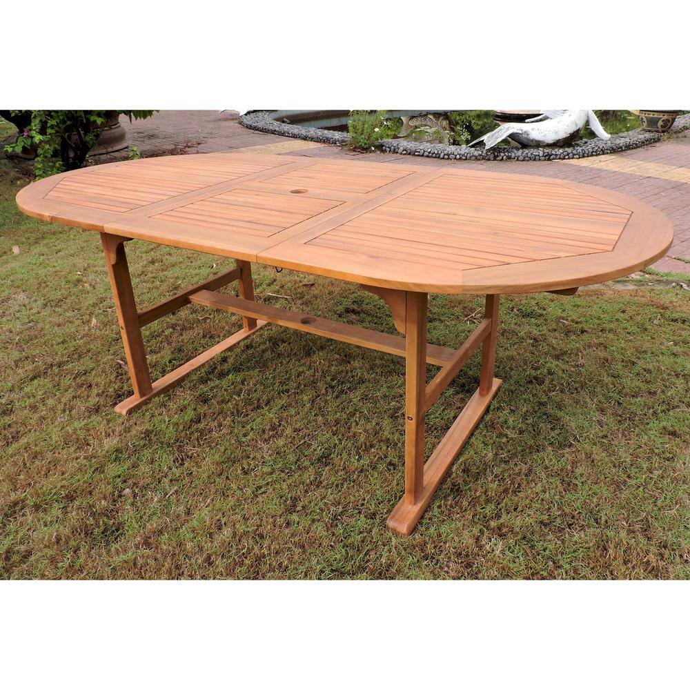 Angle. International Caravan - International Caravan Royal Fiji 59-inch / 79-inch Acacia Oval Extendable Dining Table w/Fold Out Leaf, stain color - stain.