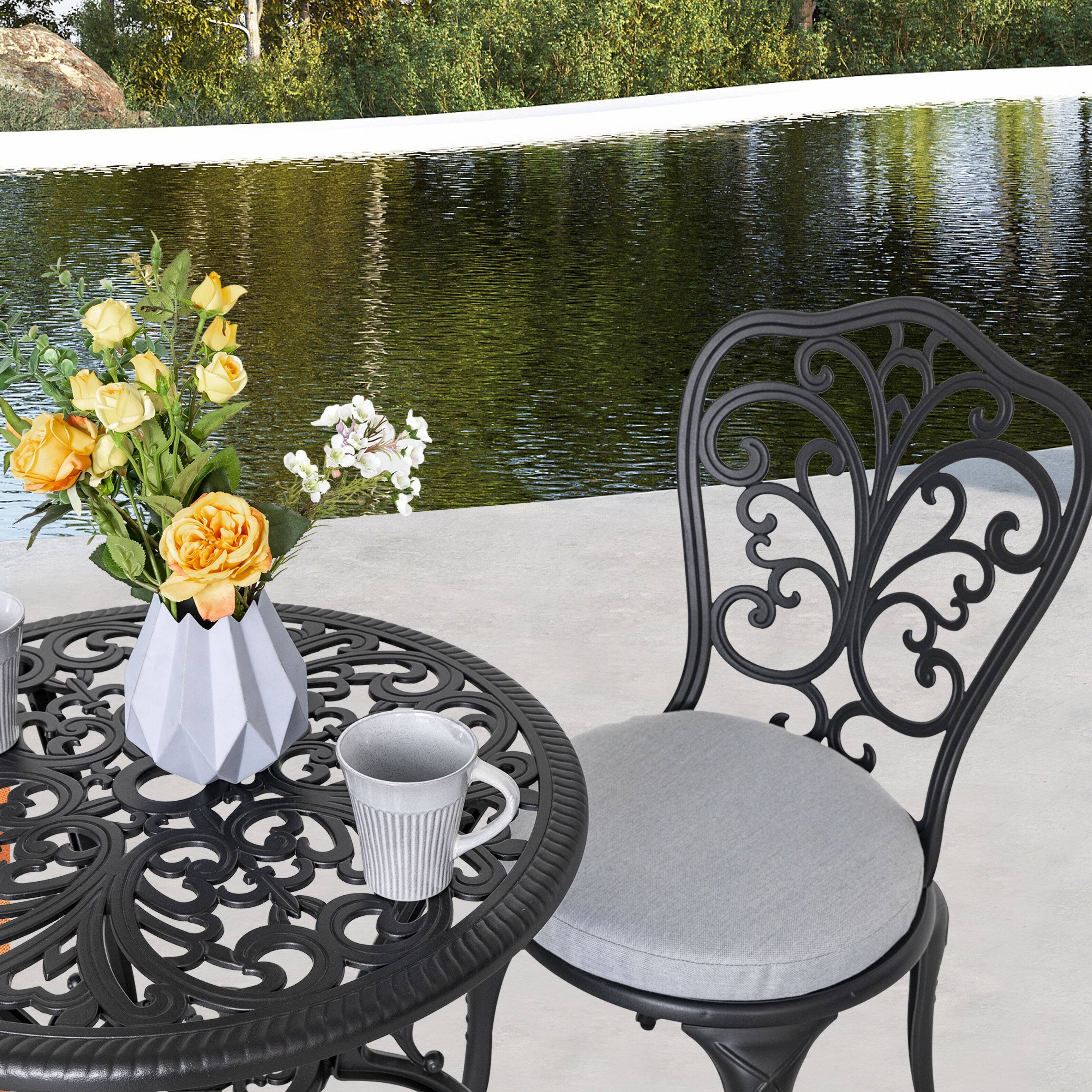 Angle. Nuu Garden - 3-Piece Cast Aluminum Outdoor Bistro Set with Gray Cushions, 24-Inch Round Table and 2 Armless Chairs - Black and Gray.