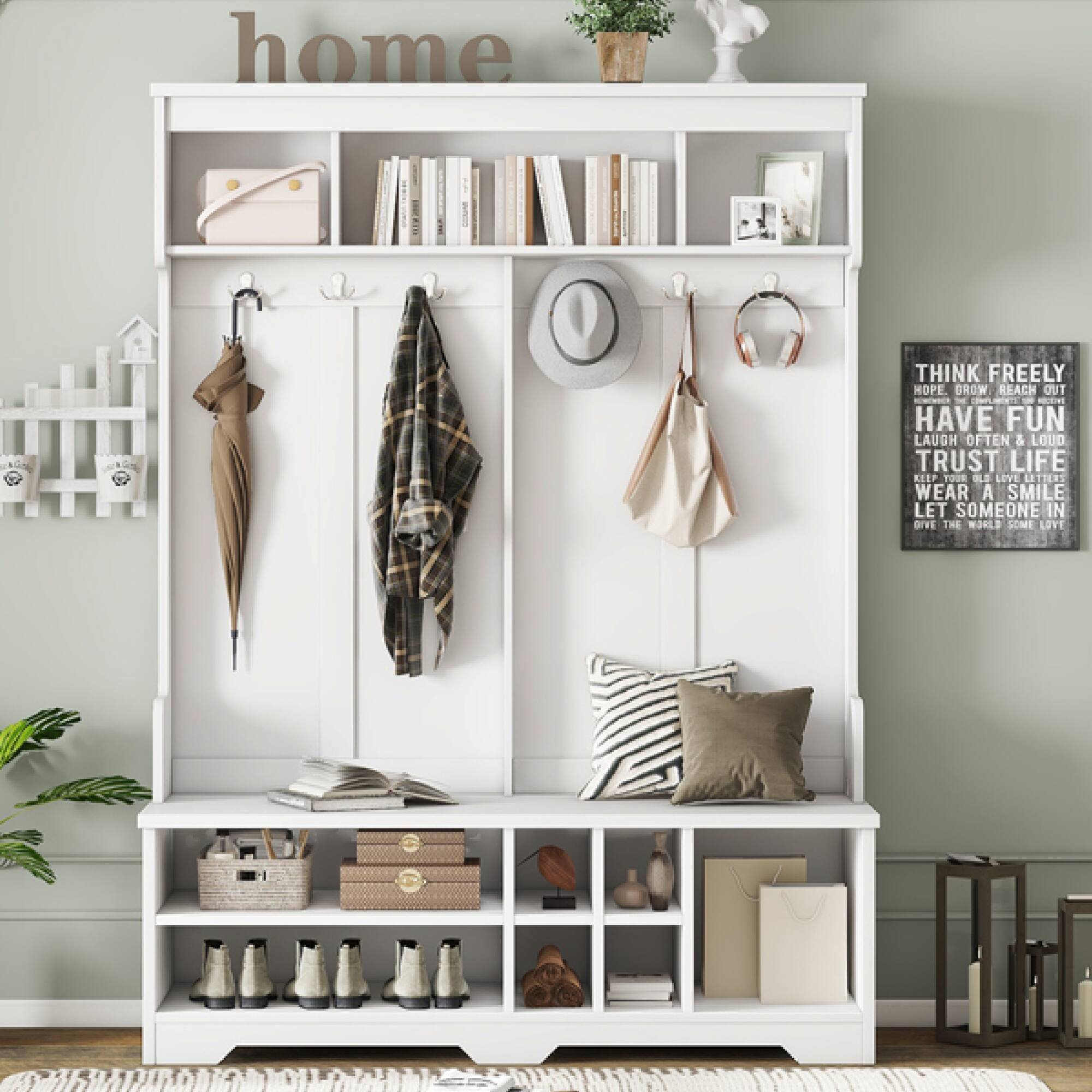 Sure, here is the corrected and grouped text from the image:

---

**home**

**THINK FREELY**  
**HOPE BROAD REACH OUT**  
**HAVE FUN**  
**LAUGH OFTEN & LOUD**  
**TRUST LIFE**  
**WEAR A SMILE**  
**LET SOMEONE IN**  
**GIVE THE WORLD SOME LOVE**

---

This text is part of a decorative sign in the image.