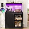 Aheaplus - Farmhouse Bar Cabinet with Power Outlets, Coffee Bar with LED Lighting, Shelves, and Sliding Barn Door - Black