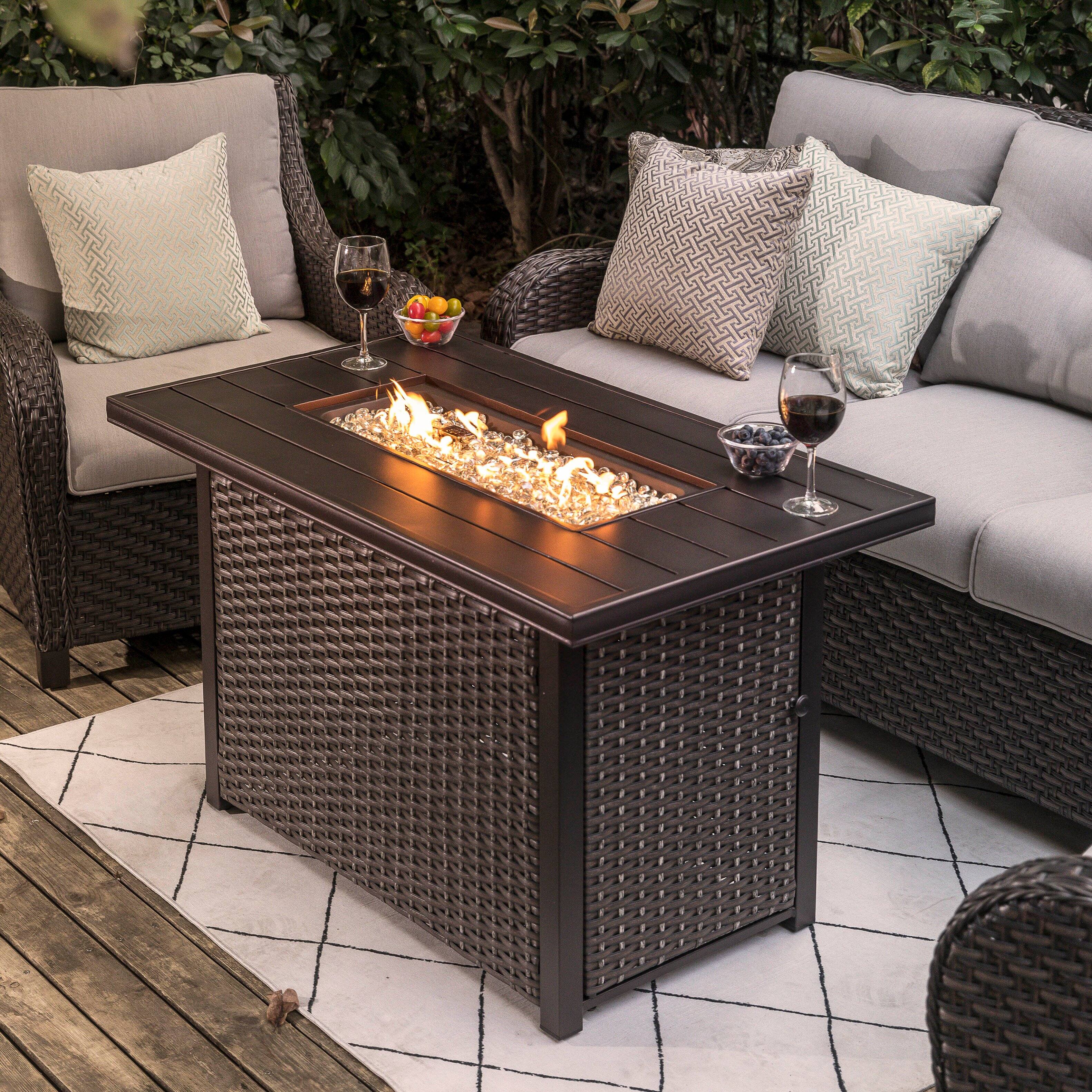Left. Nuu Garden - Outdoor 43‑inch 50,000 BTU Fire Pit Table.
