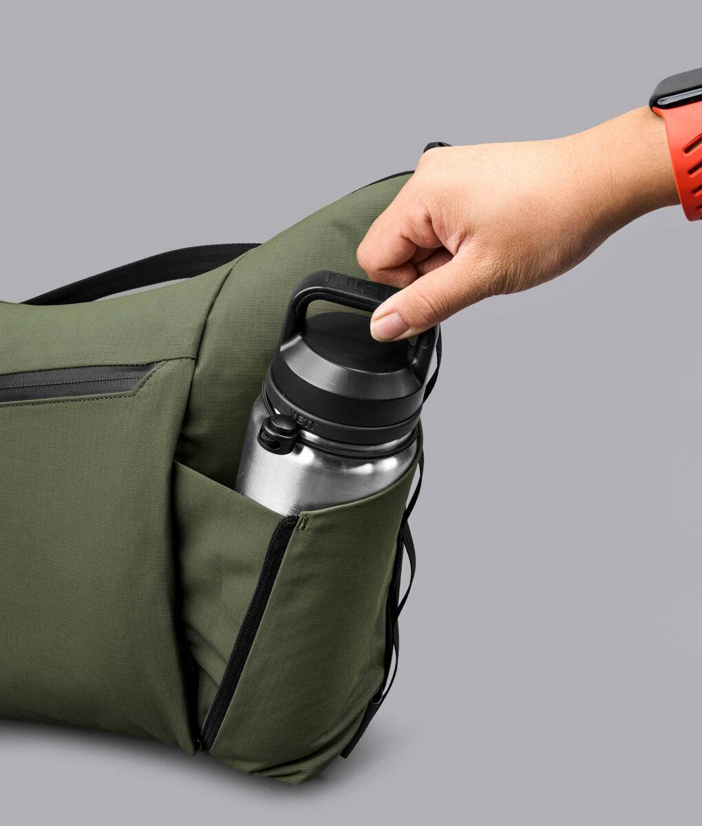 Alt View 1. ALPAKA - Flow Satchel 10L Shoulder Bag for 13" Laptop with Water Bottle Holder - Green.