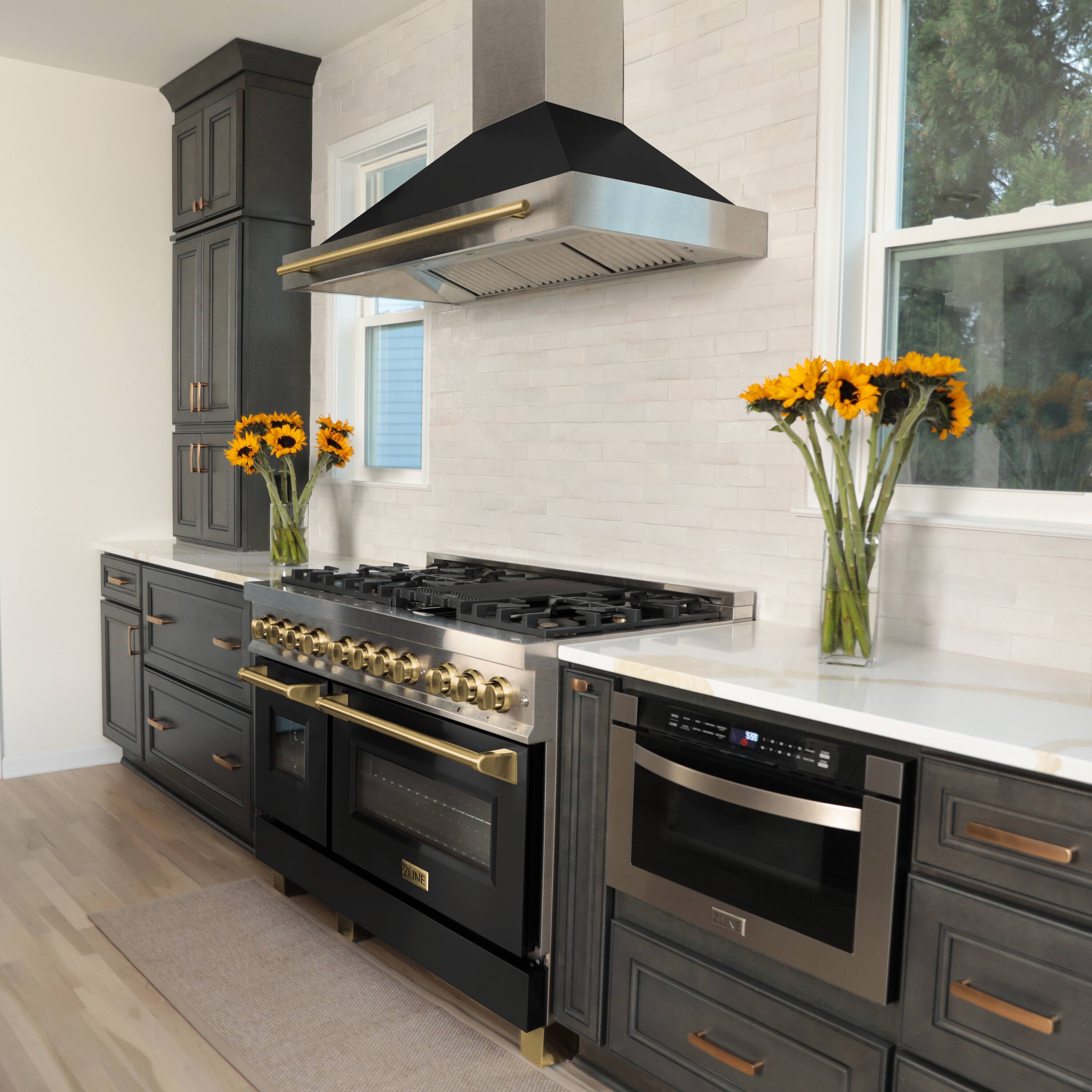 The image features a kitchen with a stove top oven and a ventilation hood. The stove is black and gold, and there are two vases of flowers on the countertop. The kitchen also has a window, providing natural light to the space. The oven is located under the ventilation hood, which helps to remove cooking odors and smoke. The overall atmosphere of the kitchen appears to be clean and well-maintained, with a focus on both functionality and aesthetics.