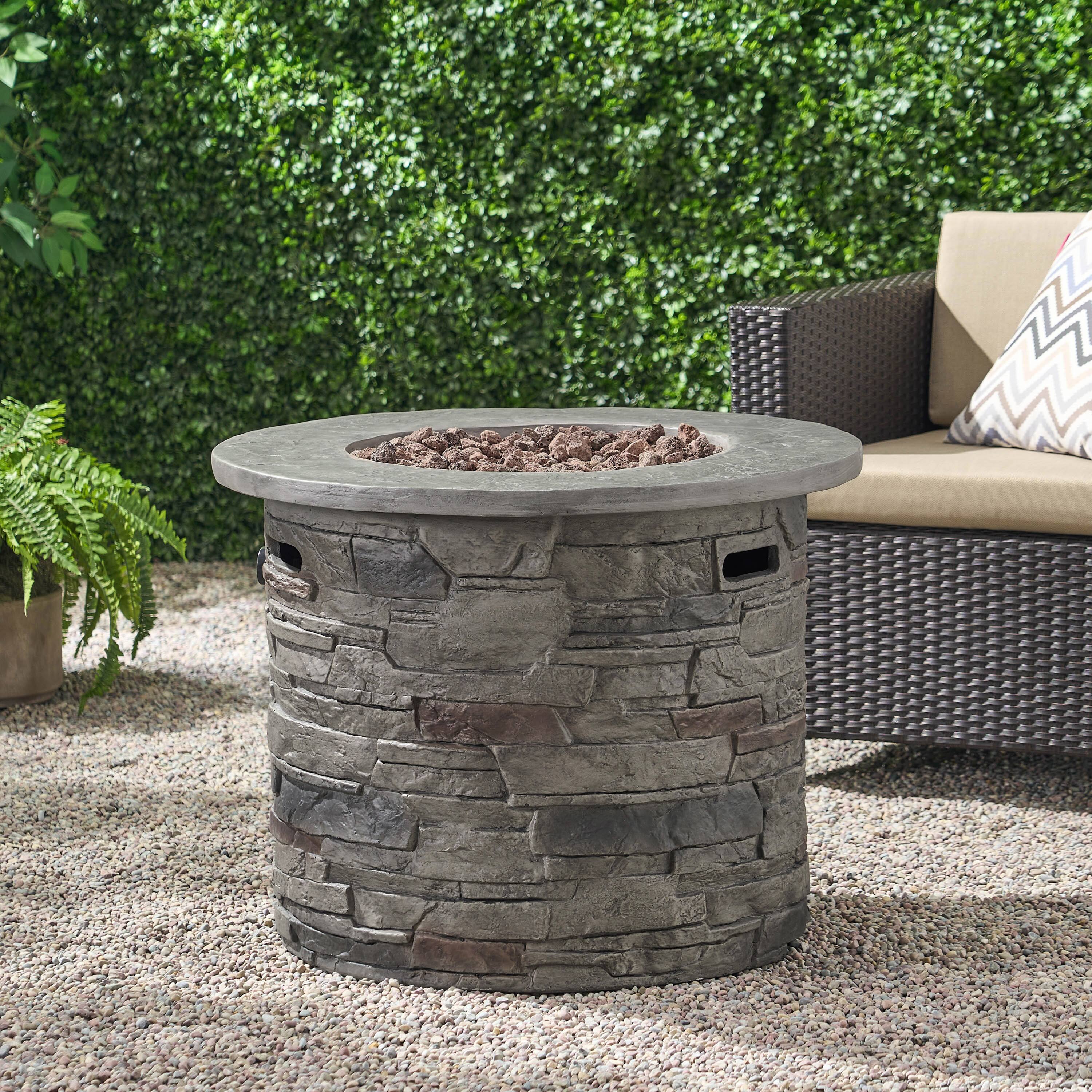Left. APRILSOUL - Outdoor 32 inch Round MgO Propane Fire Pit Grey Top 40000 BTU - Stone Gray.