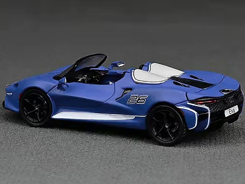 Alt View 2. CM Models - McLaren Elva Convertible #26 Matt Blue with White Stripes and Extra Wheels 1/64 Diecast Model Car by CM Models.