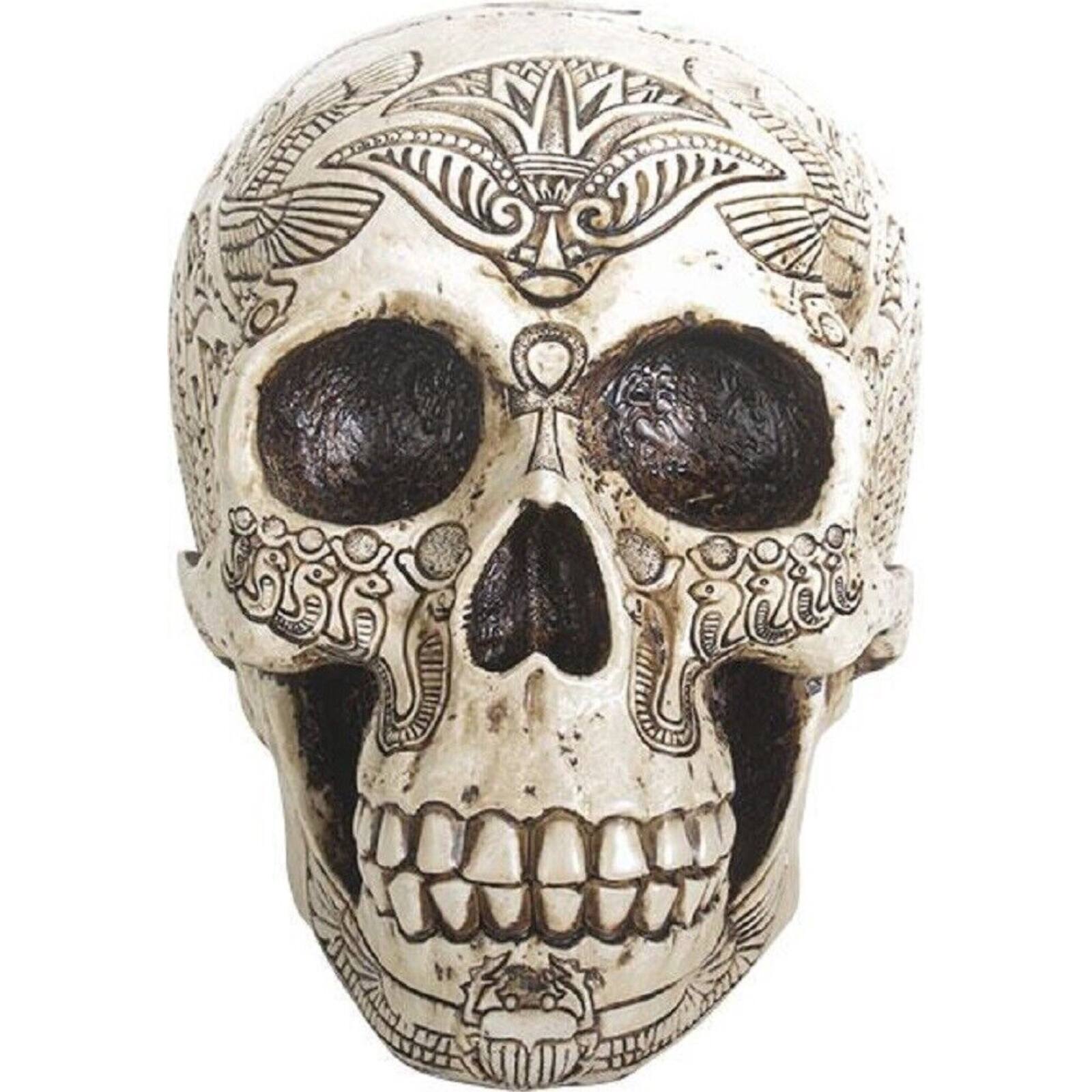 Left. Pacific Trading - Ancient Egypt Human Skull Etched with Egyptian Symbols Figurine Skeleton 6 inch - Beige.