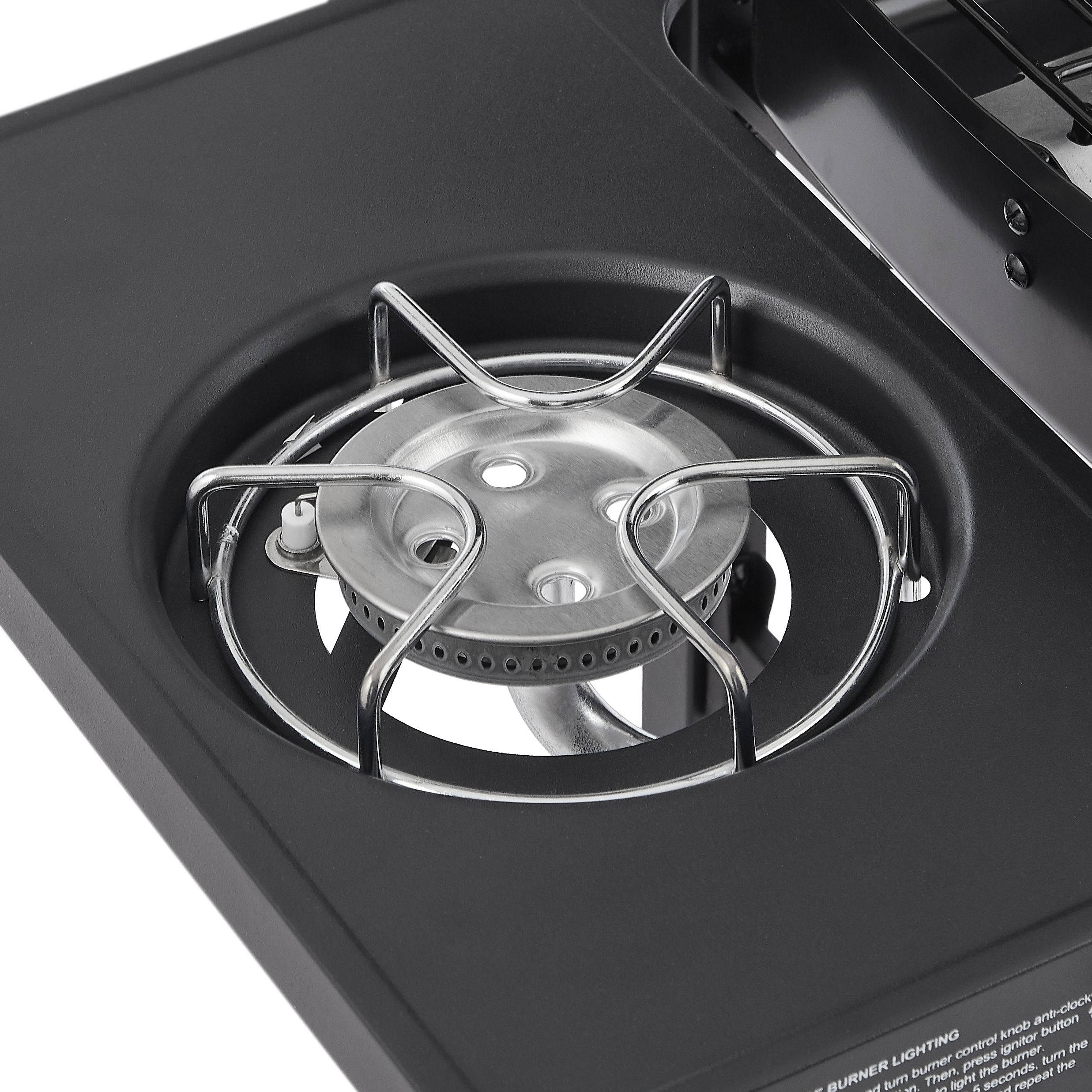 Anti-clock knob LIGHTING control ignitor burner. Turn the burner knob anti-clockwise, press the IGNITOR button, then turn the BURNER -A. Light A for 5 seconds. Repeat.