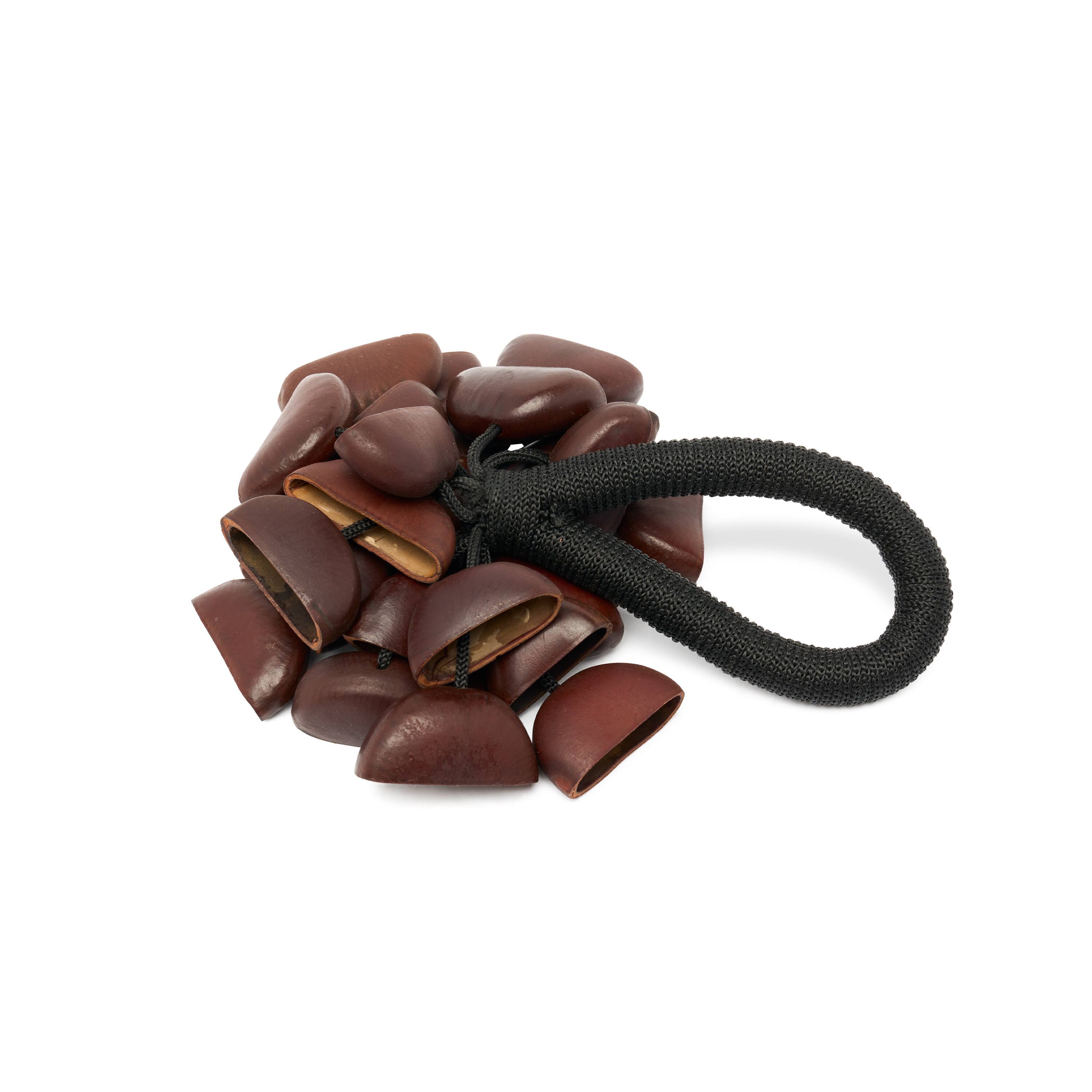 Angle. Latin Percussion - Bendo Rattle with Handle Percussion Shaker Instrument.