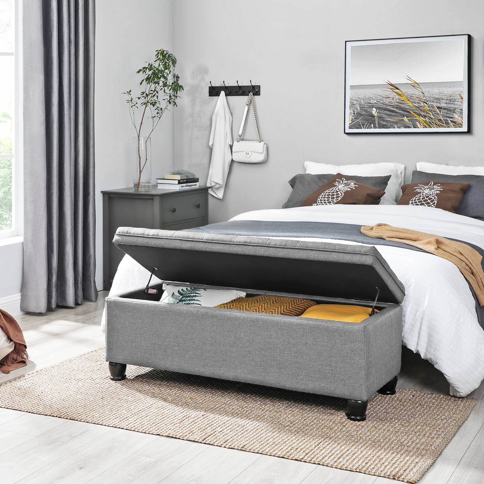 Angle. Songmics Home - Storage Ottoman,46.5 Inches Long Bed End Stool,Solid Wood Legs,Non-Slip Foot Pads,330.6 lb Load Capacity - Light Gray.