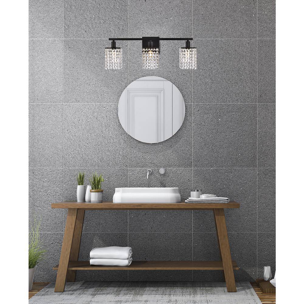 Angle. Living District - Phineas 3 lights bath sconce in black with clear crystals - Black And Clear.