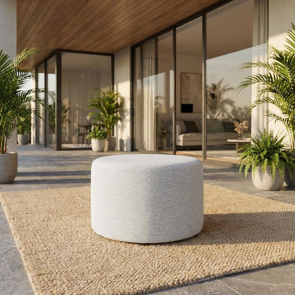 Angle. Outdoor Escape - Round Heathered Fabric Upholstered Ottoman, neutral tones, comfortable seating - Gray.
