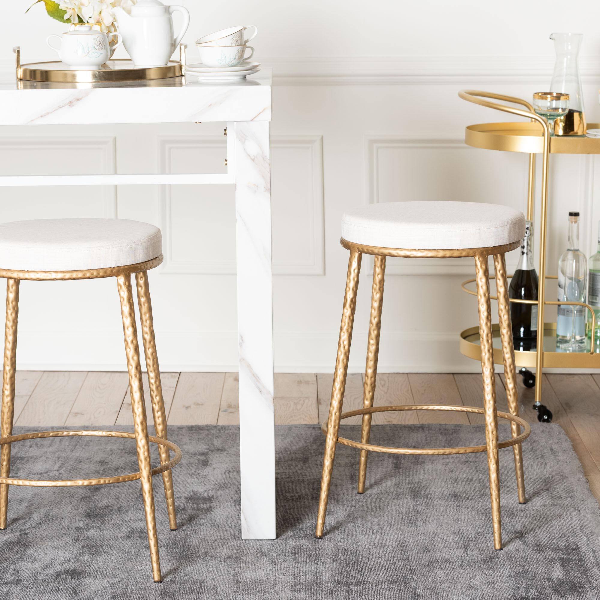 Alt View 2. Baxton Studio - Jessa Counter Stool - Modern Rustic Backless Stool with Hand-Forged Metal Frame and Integrated Footrest - Ivory/Gold.