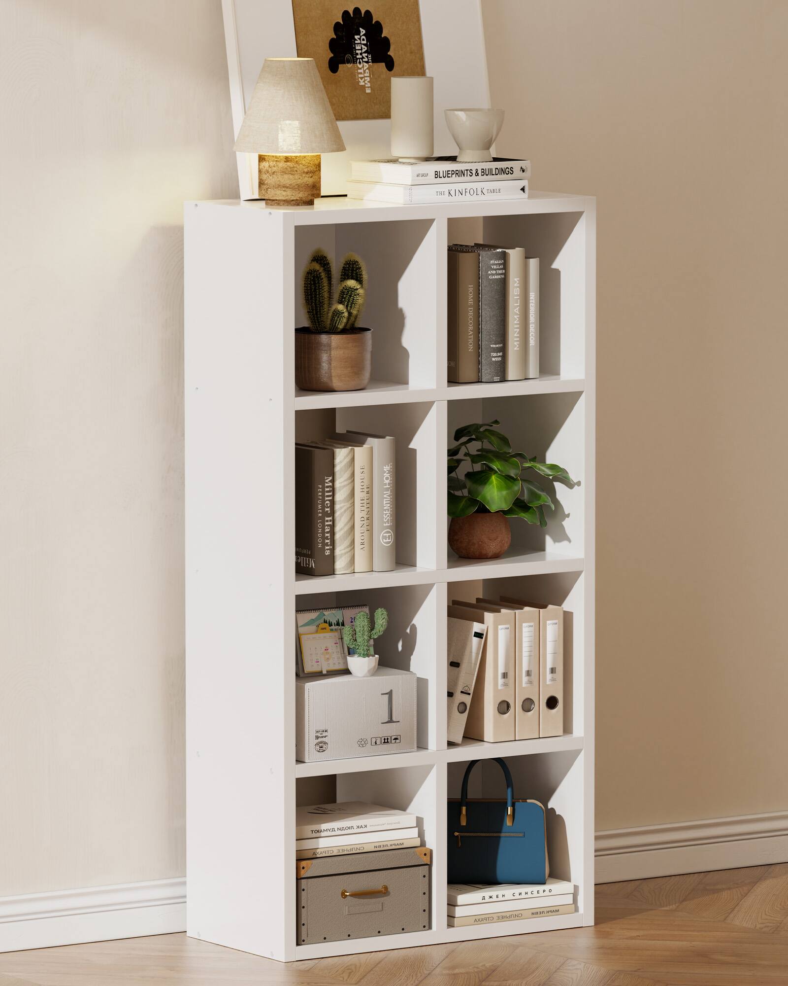 Sure, here is the corrected and grouped text from the image:

---

**Top Shelf:**
- BLUEPRINTS & BUILDINGS
- THE KINFOLK TABLE

**Second Shelf:**
- MINIMALISM A TO Z
- TECOR ARTTEAR
- Miller
- Harris
- PILEUSE
- IESL ENSIRS

**Third Shelf:**
- A REN

**Fourth Shelf:**
- (Various books with partially visible titles, including "MILLER" and "HARRIS")

**Fifth Shelf:**
- (Various books and binders, including "1" and "TOMÁS INDIO MAX")

**Bottom Shelf:**
- (Various books and binders, including "AKEN CHNCEPO")

---

This grouping reflects the visible text on the books and items in the image.