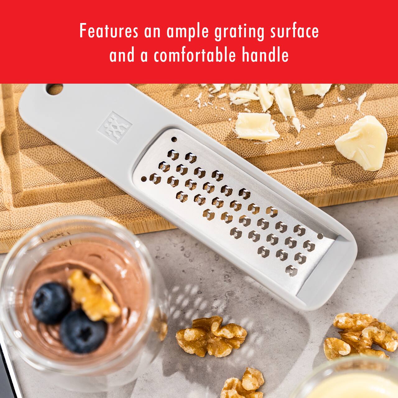 Features an ample grating surface and a comfortable handle